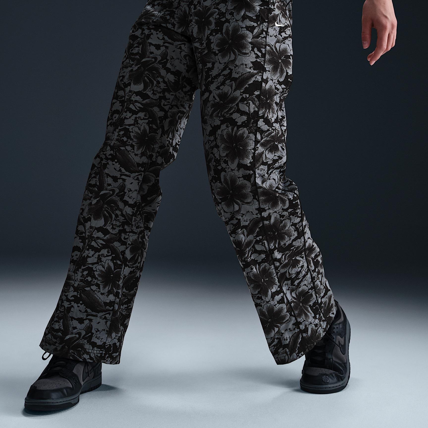 Nike Sportswear Windrunner Women's UV Protection Mid-Rise Woven Printed Pants Product Image