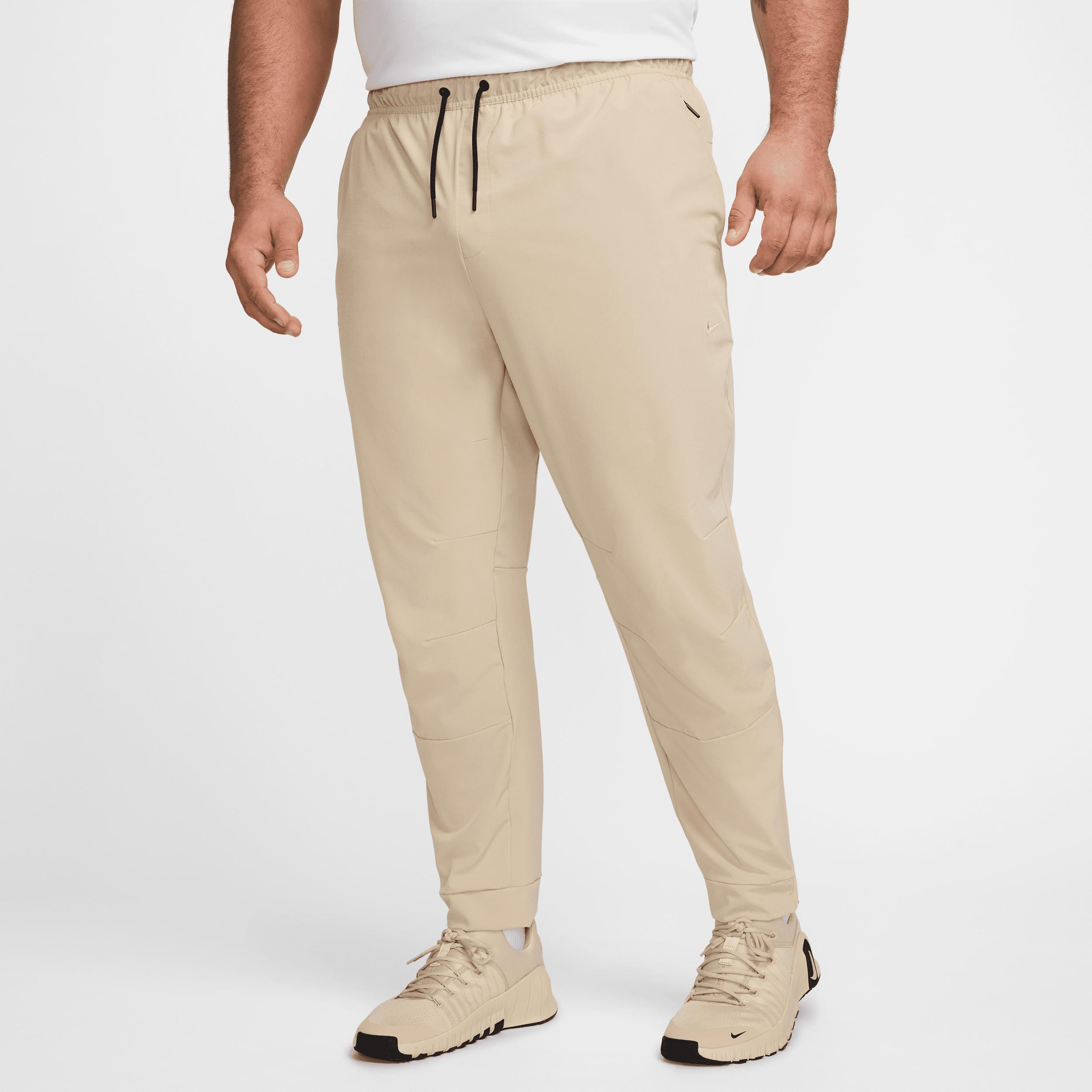 Nike Men's Unlimited Dri-FIT Zippered Cuff Versatile Pants Product Image