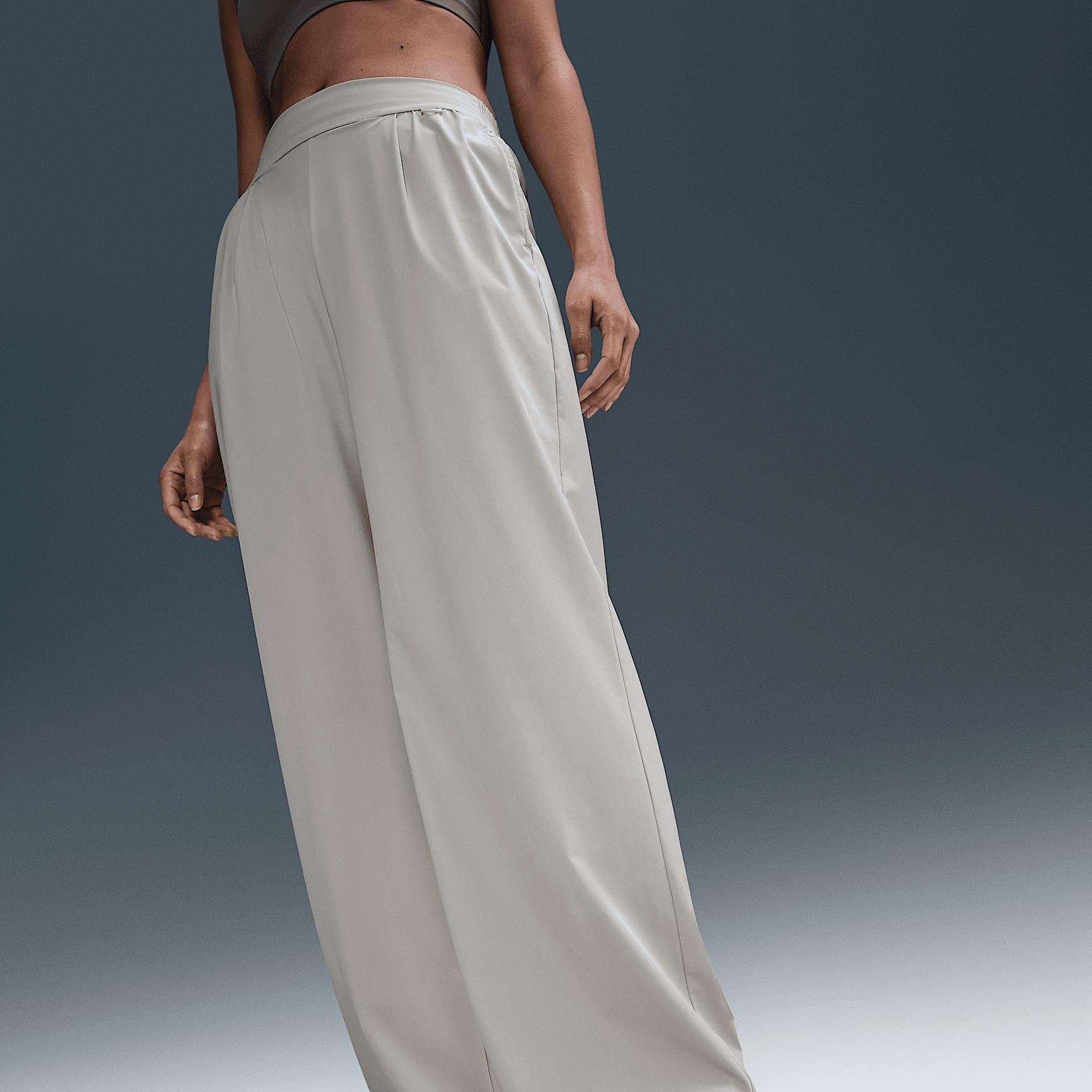 Nike Womens 24.7 PerfectStretch Dri-FIT High-Waisted Loose Wide-Leg Pants | HM8389-104 Product Image