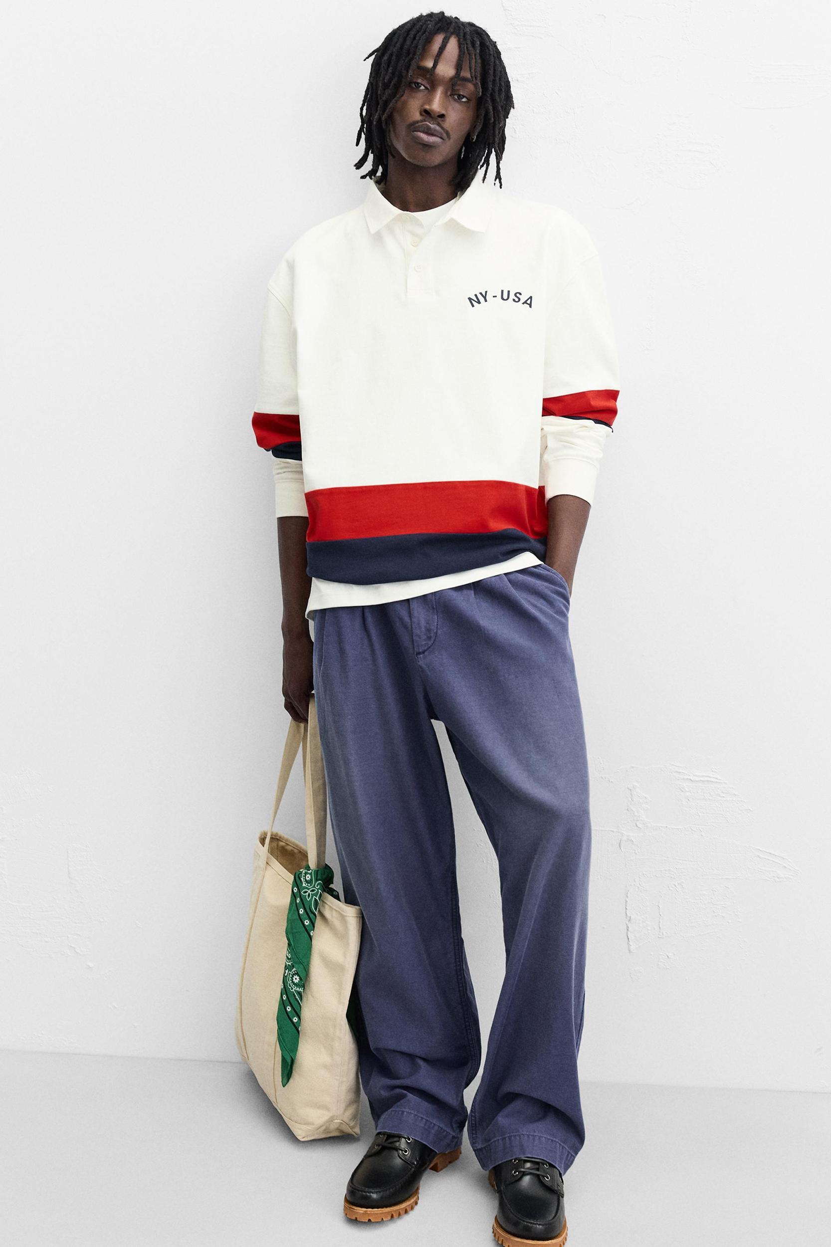 POLO WITH CONTRASTING SIDE STRIPE Product Image