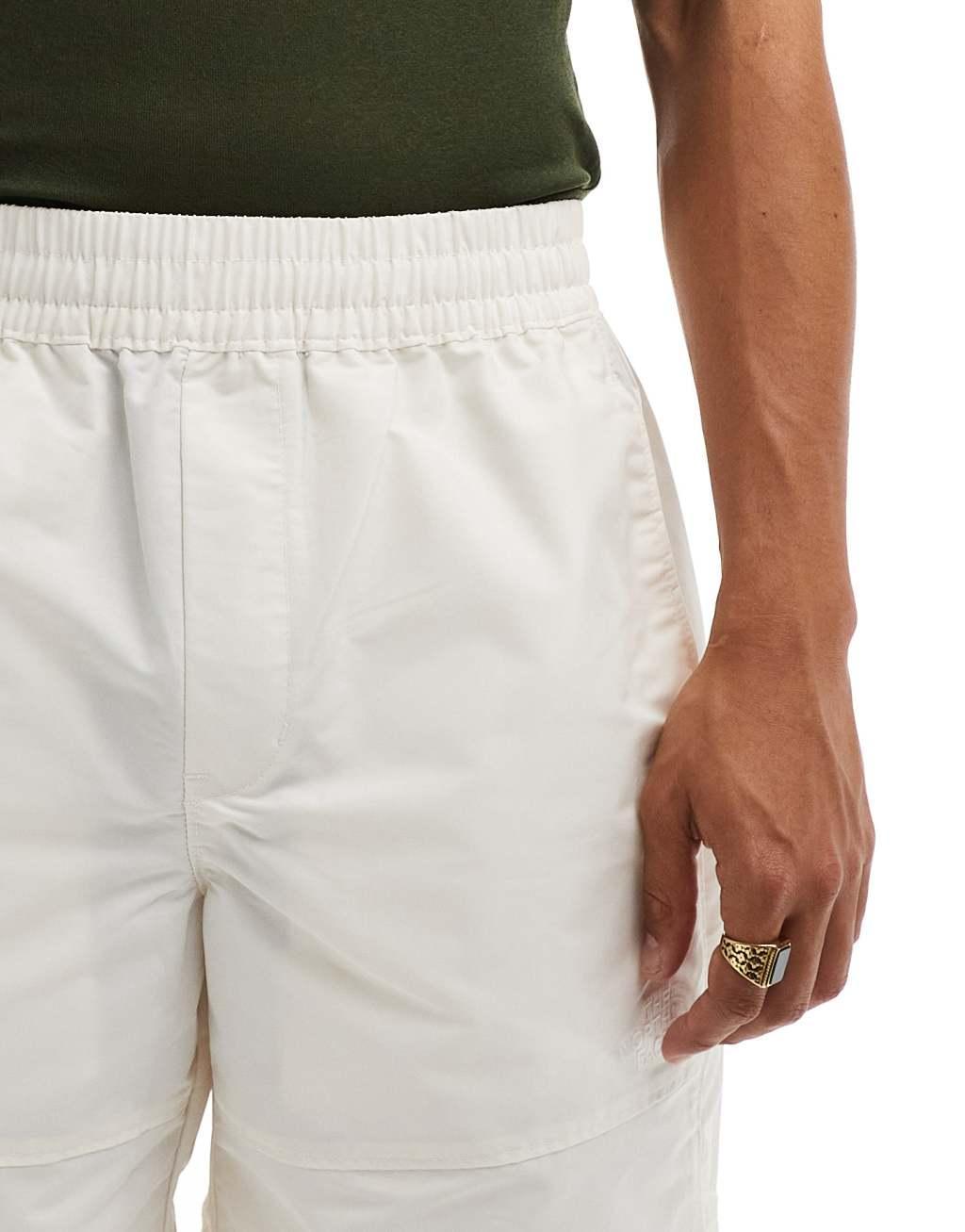 The North Face Easy Wind shorts in cream Product Image