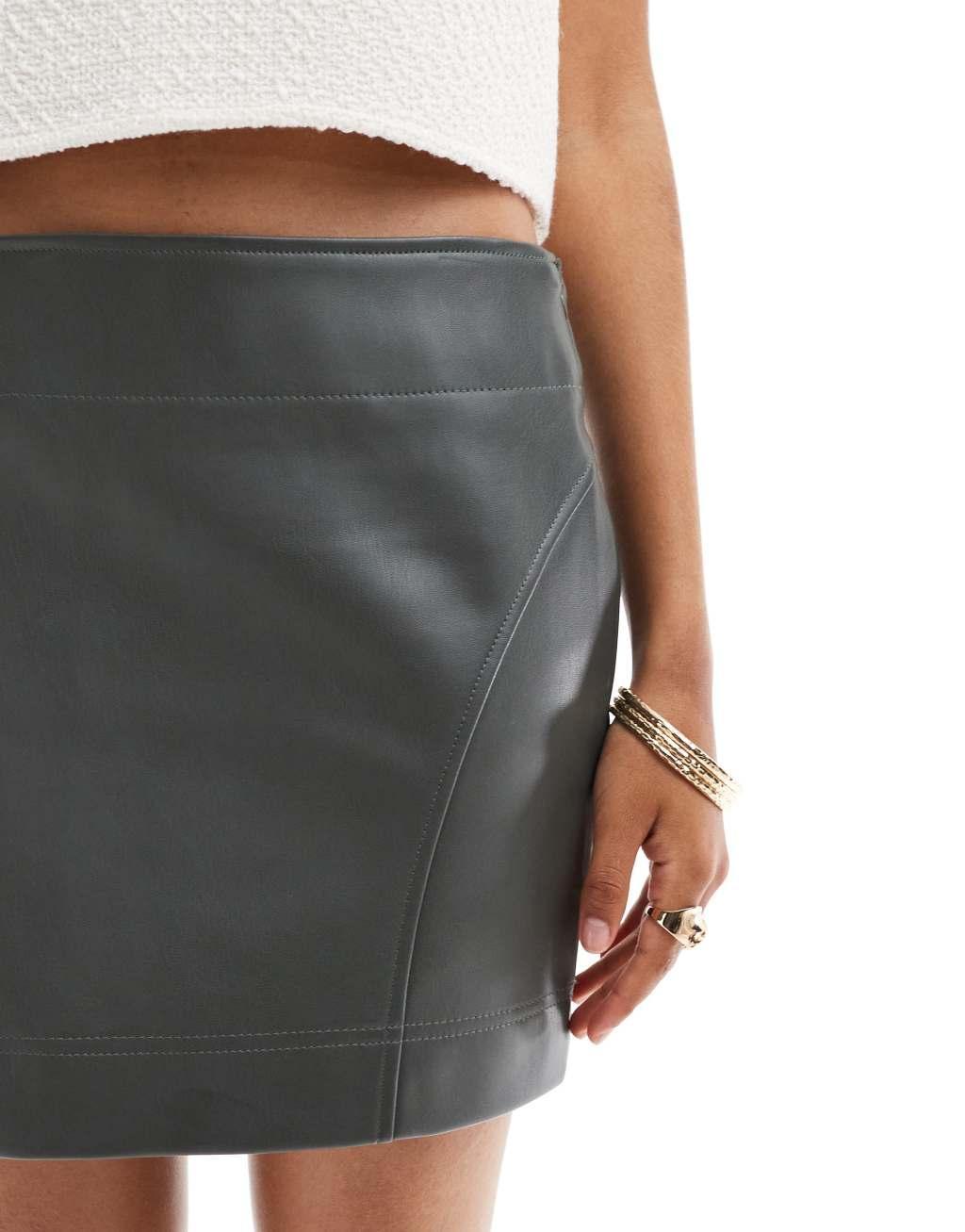 ASOS DESIGN leather look mini skirt in khaki Product Image