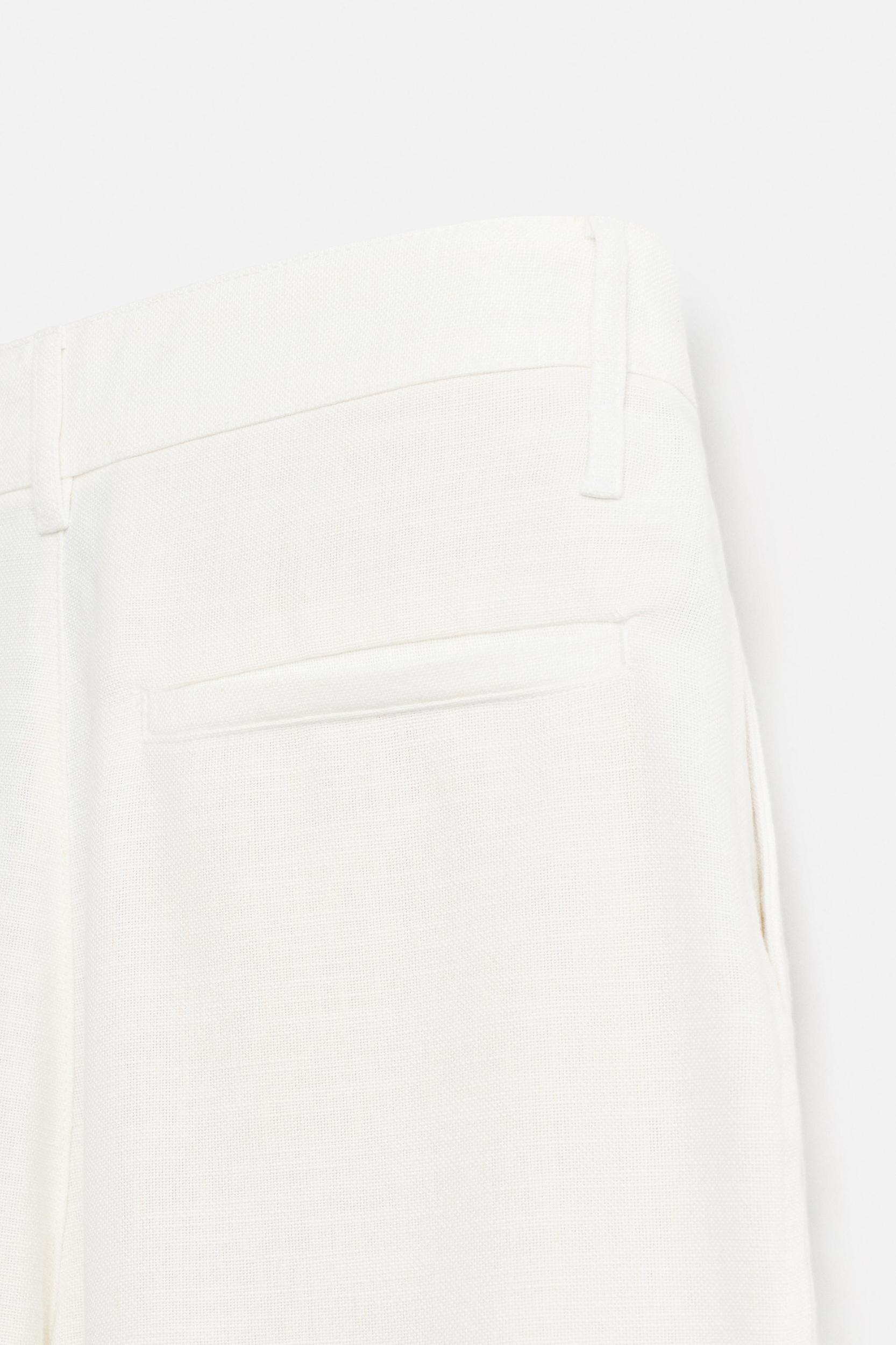 PLEATED RELAXED FIT PANTS Product Image