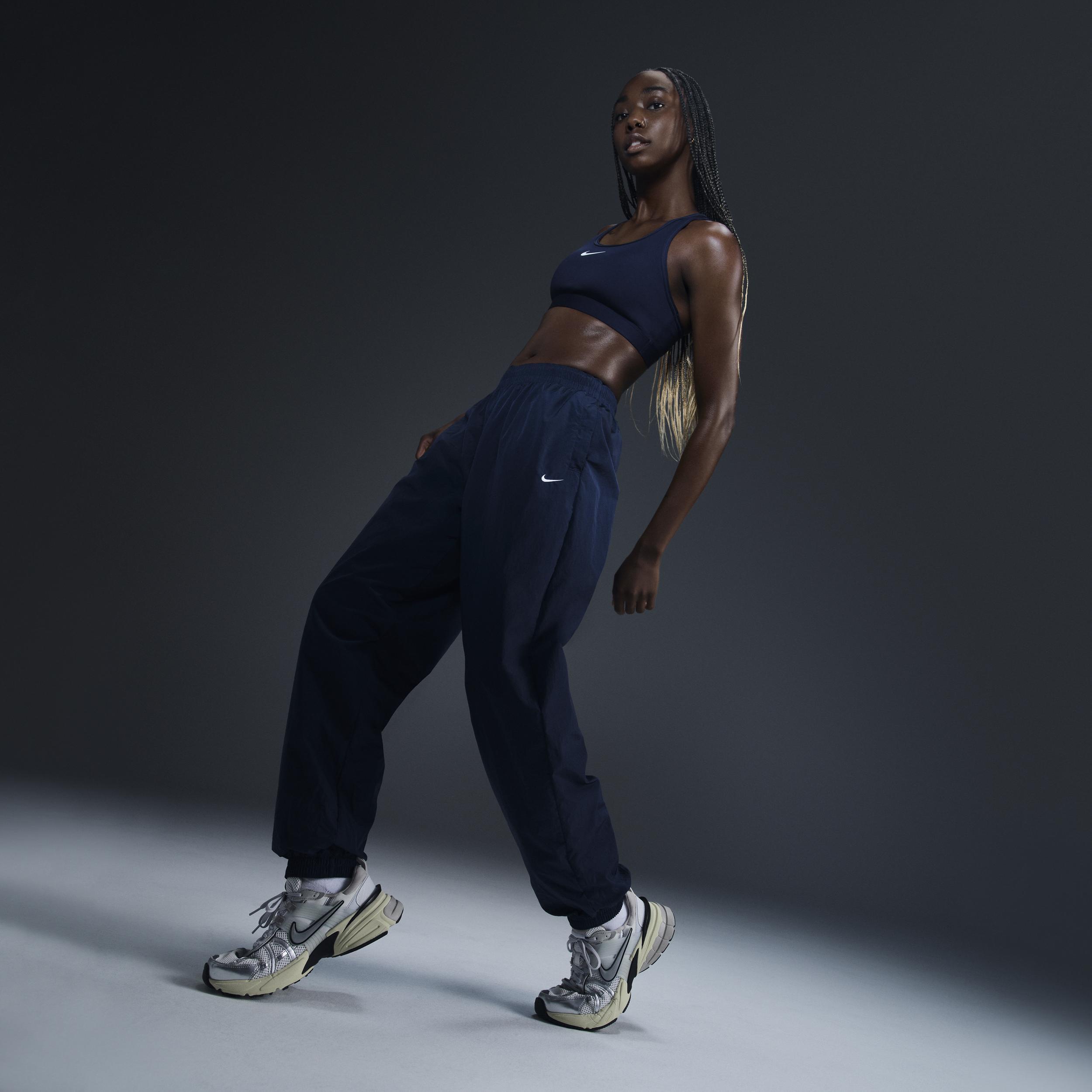 Women's Nike Sportswear Essential Mid-Rise Oversized Woven Jogger Pants Product Image