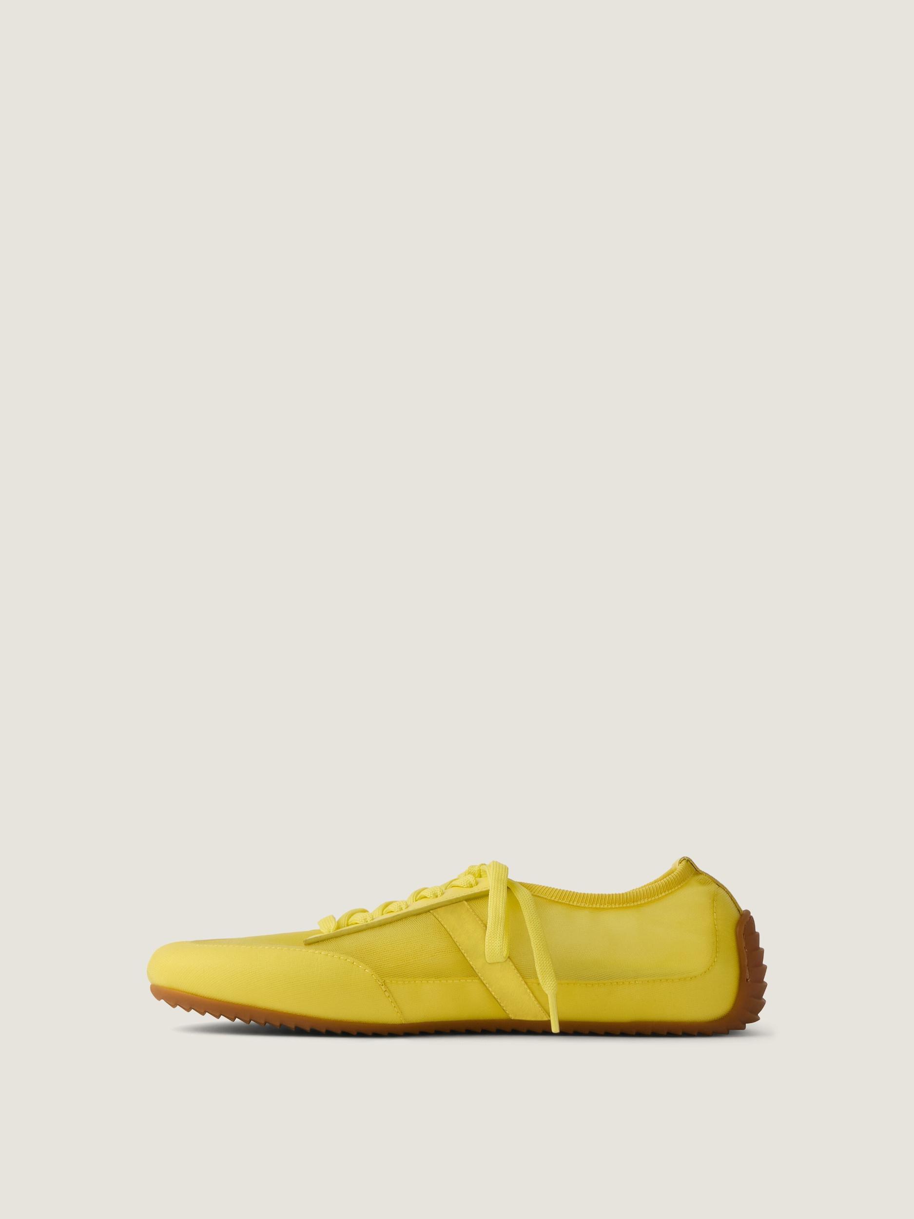 Slim sneakers in transparent mesh and leather Product Image