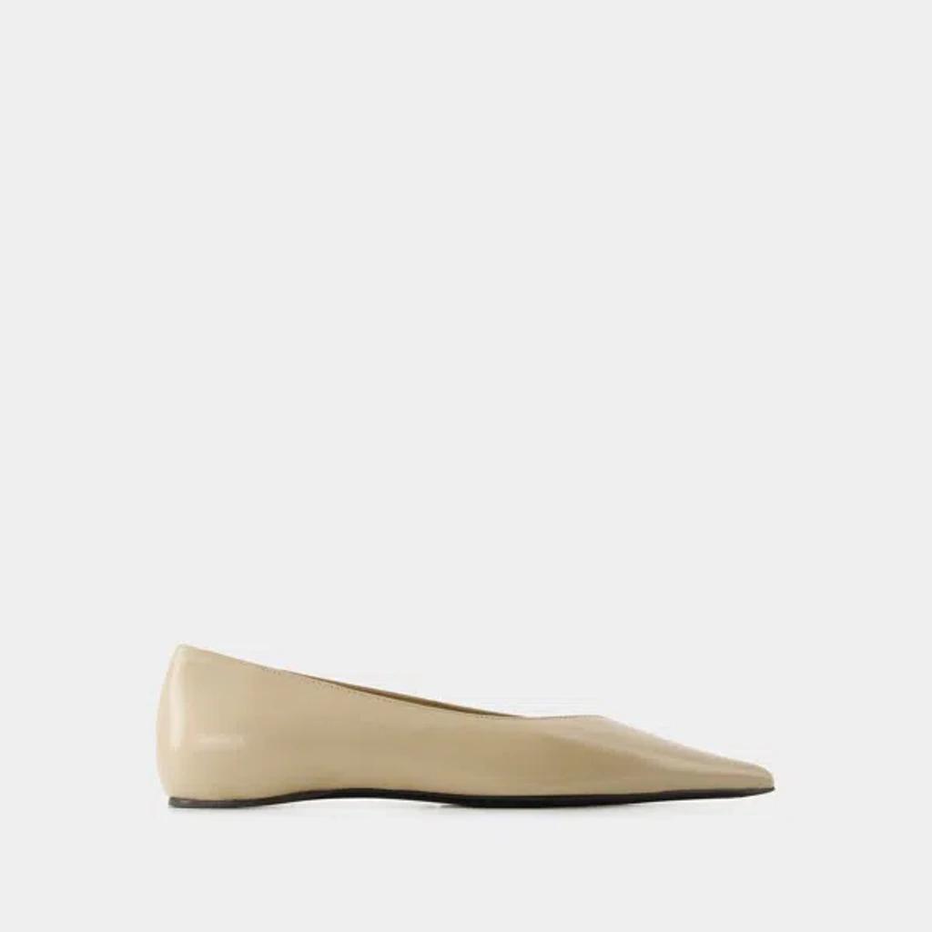 The Asymmetric Ballerina Leather Flats In Beige Product Image