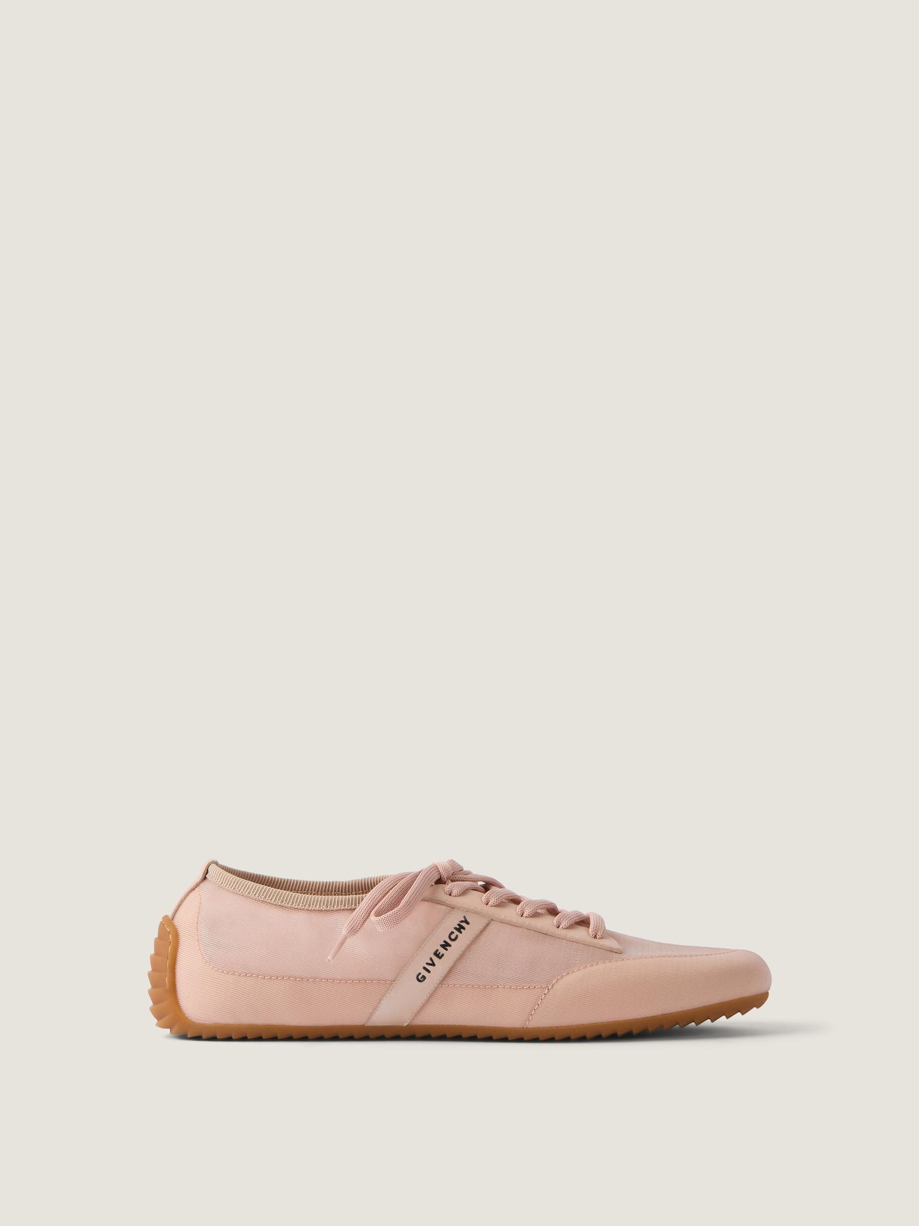 Slim sneakers in transparent mesh and leather Product Image