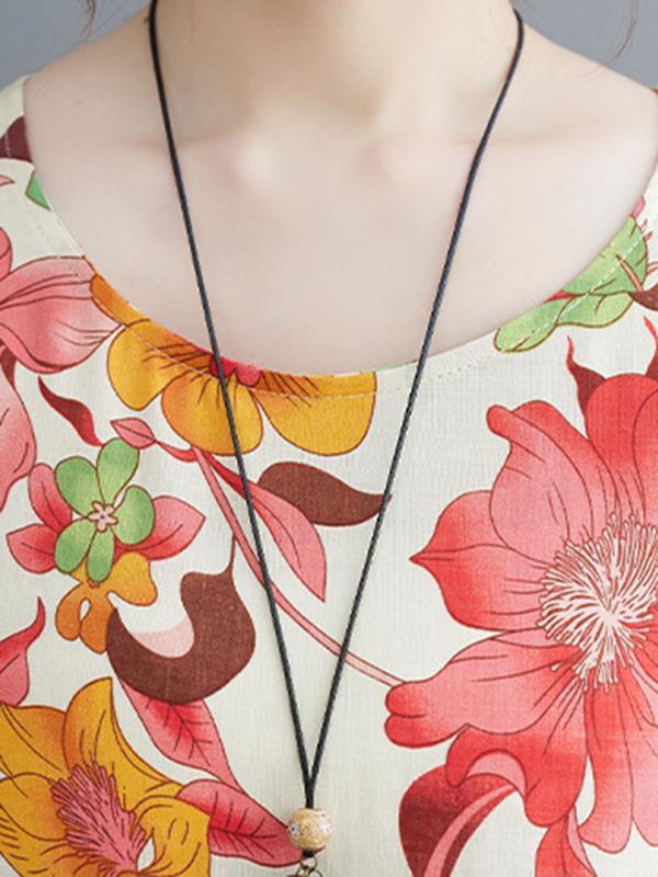 Loose Short Sleeves Pleated Printed Split-Joint Round-Neck Midi Dresses Product Image