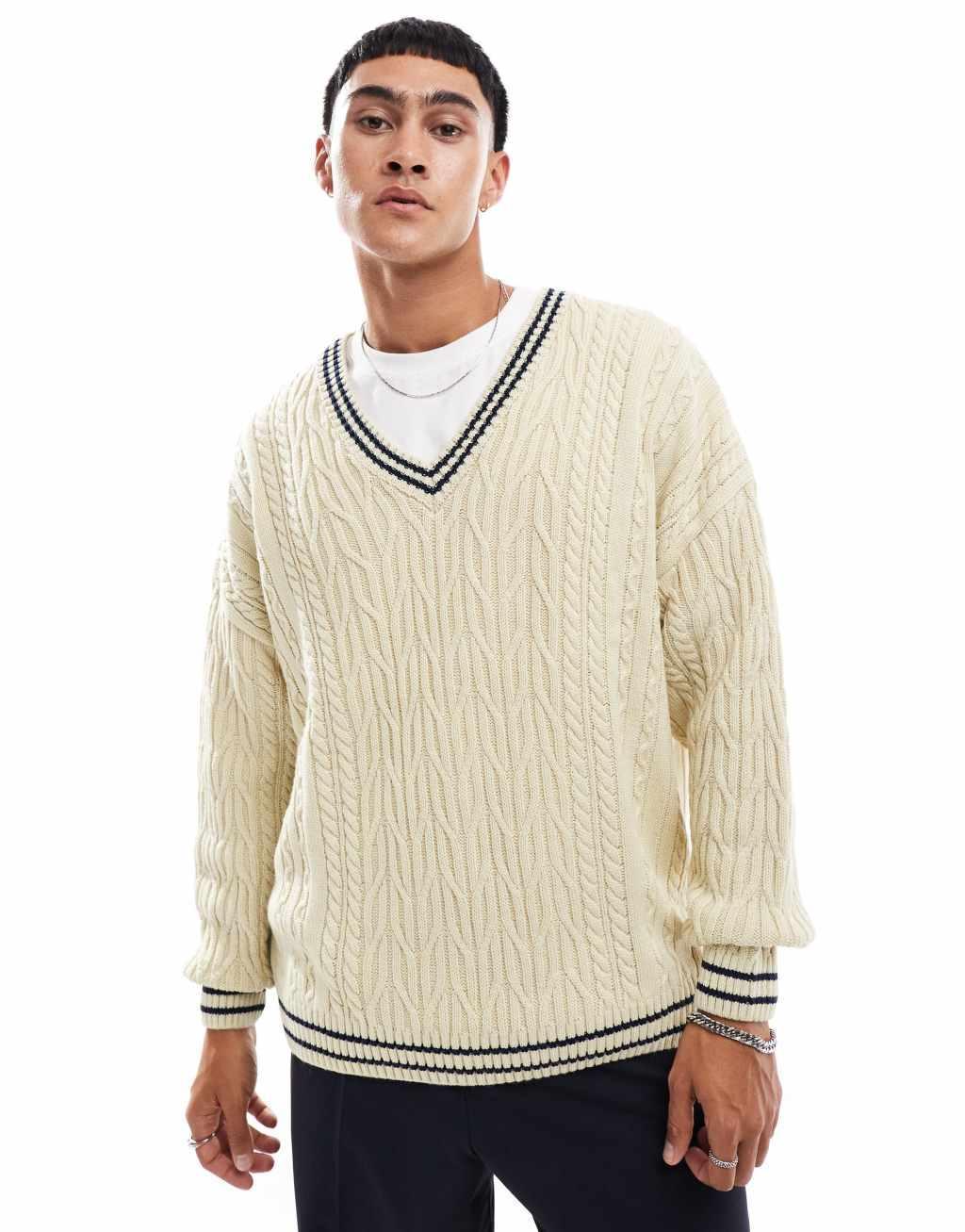 ASOS DESIGN oversized cable knit cricket sweater in cream with navy tipping Product Image