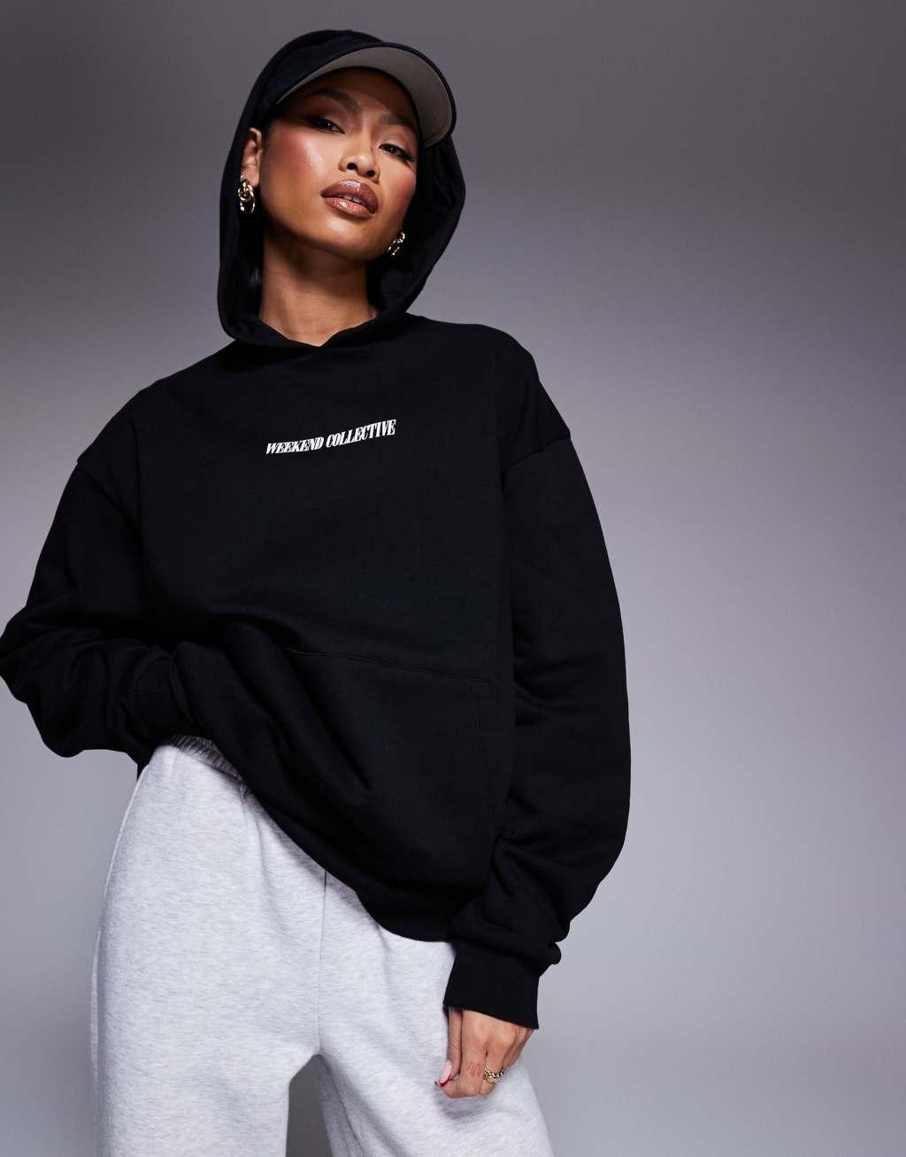 Weekend Collective oversized hoodie with stacked back logo in black Product Image