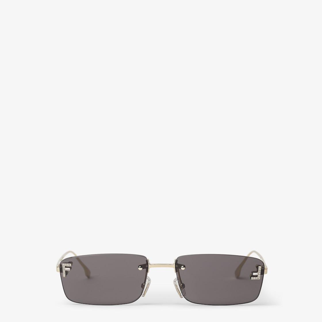 Fendi First CrystalGold-colored sunglasses with gray lenses Product Image