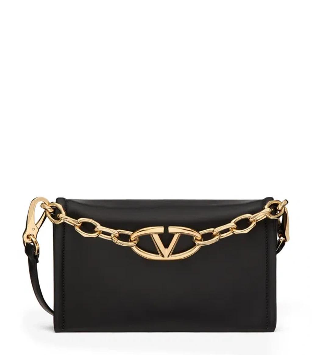 VALENTINO GARAVANI Mini Leather Vlogo Chain Clutch Bag In Black Product Image