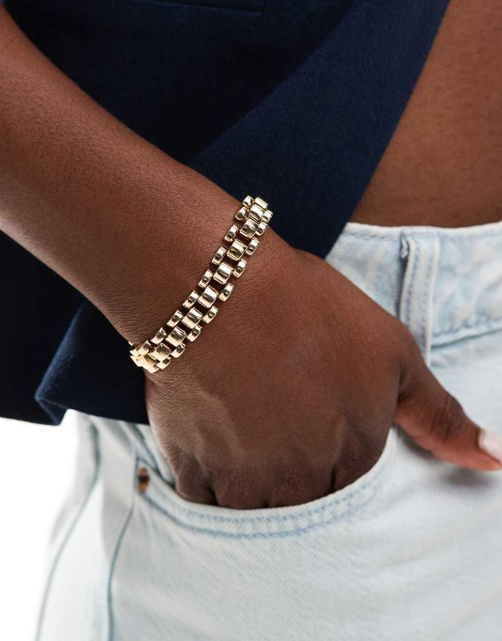 ASOS DESIGN bracelet with watch strap style detail in gold tone Product Image