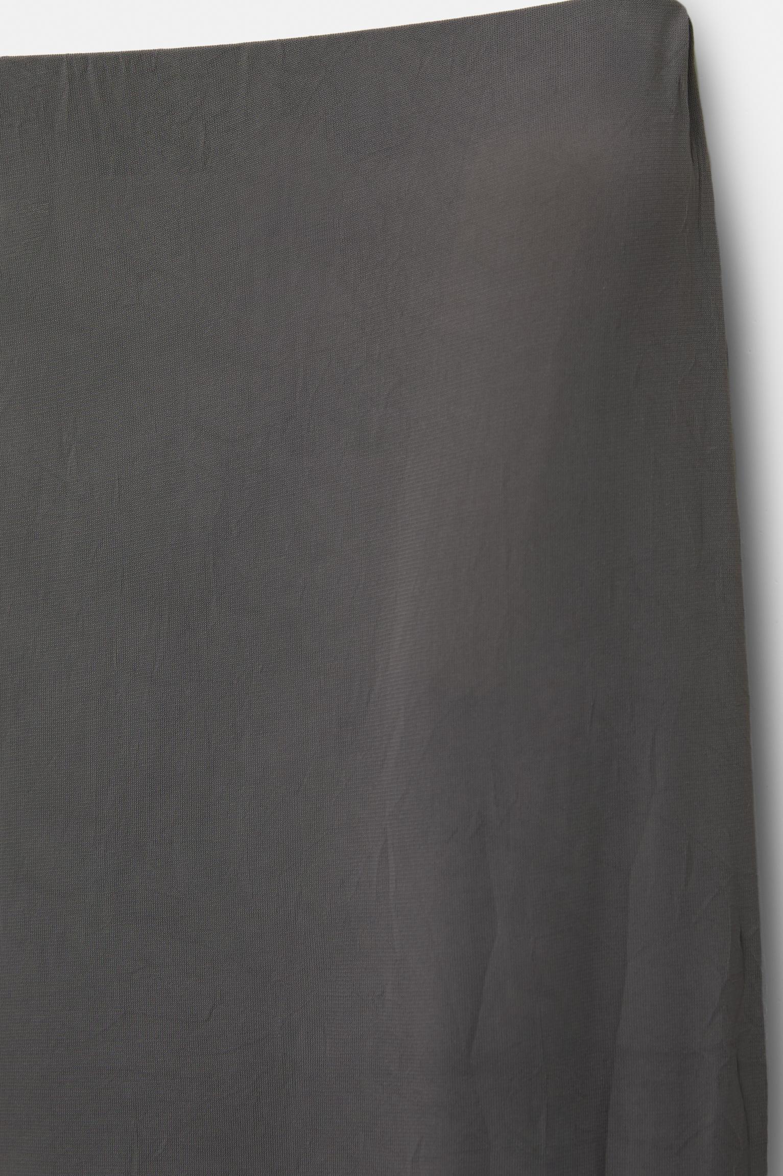 Creased-effect flared pants Product Image