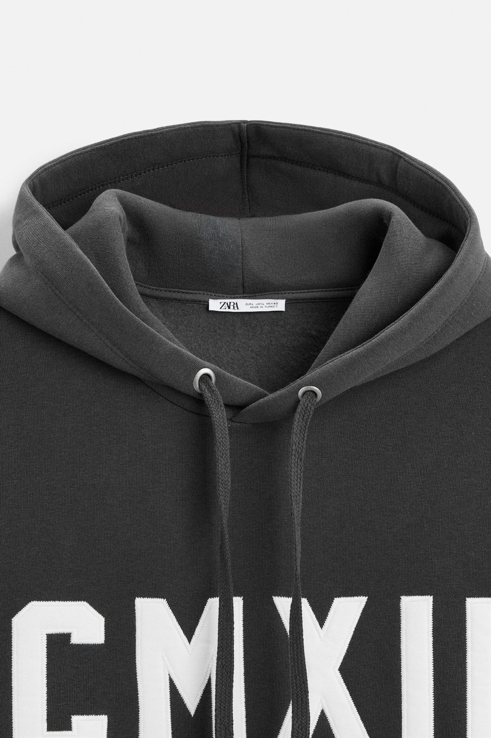 HOODED SWEATSHIRT WITH TEXT Product Image