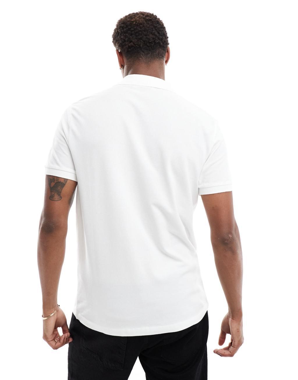 ASOS DESIGN pique polo in white Product Image