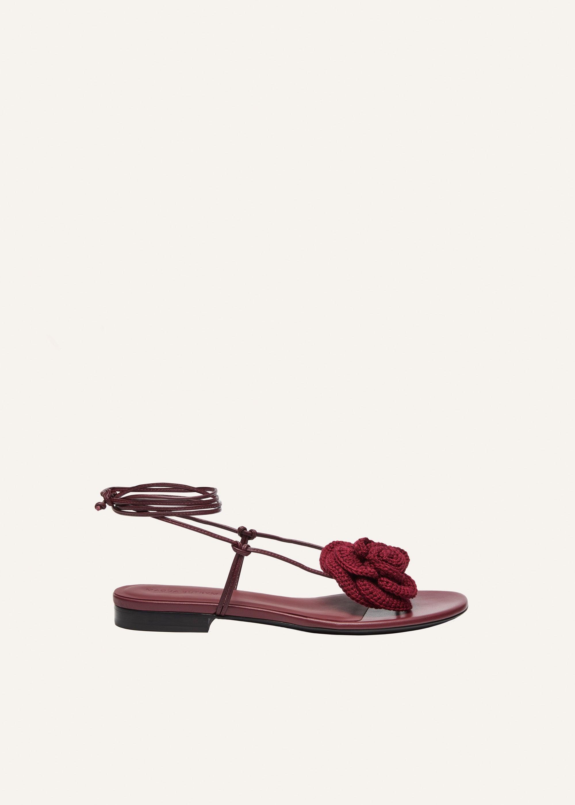 Wrap around flat flower sandals in maroon crochet Product Image