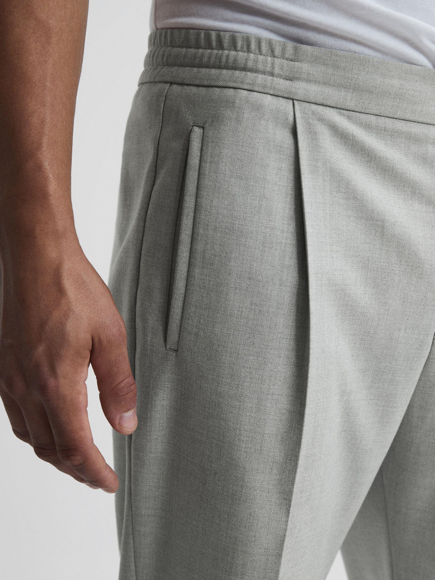 Relaxed Drawstring Trousers with Turn-Ups in Soft Grey Product Image