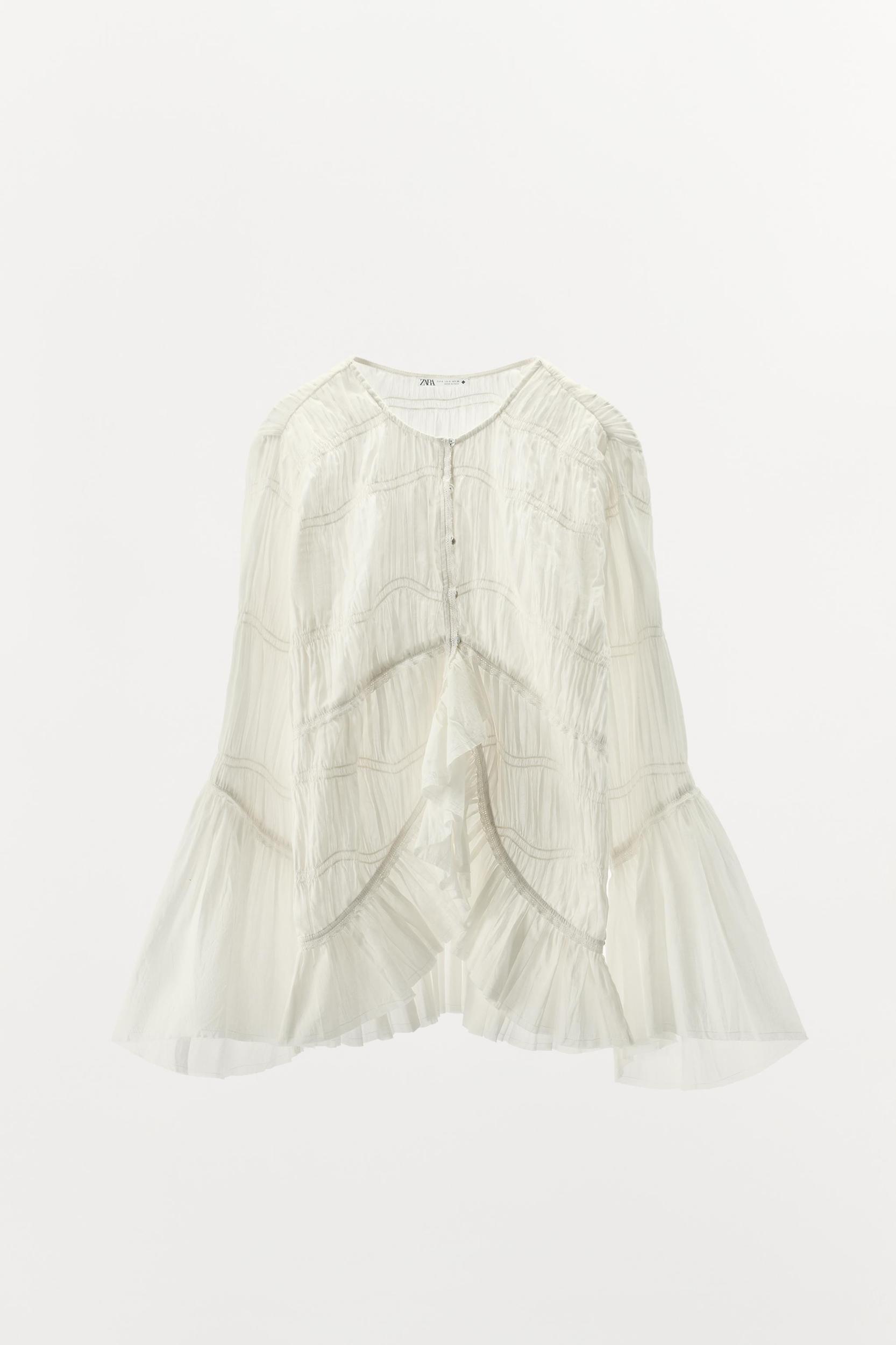 ASYMMETRIC TEXTURED BLOUSE LIMITED EDITION Product Image