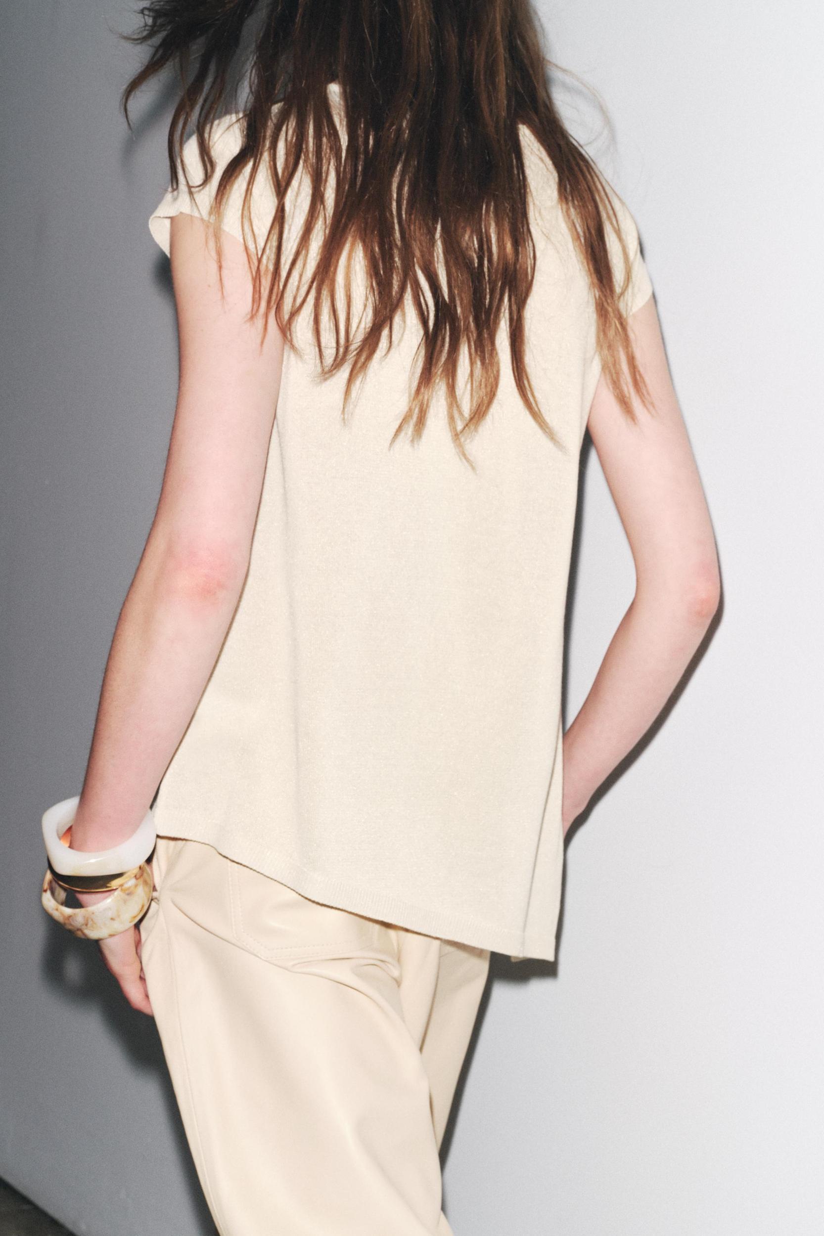 ASYMMETRIC HEM KNIT TOP Product Image