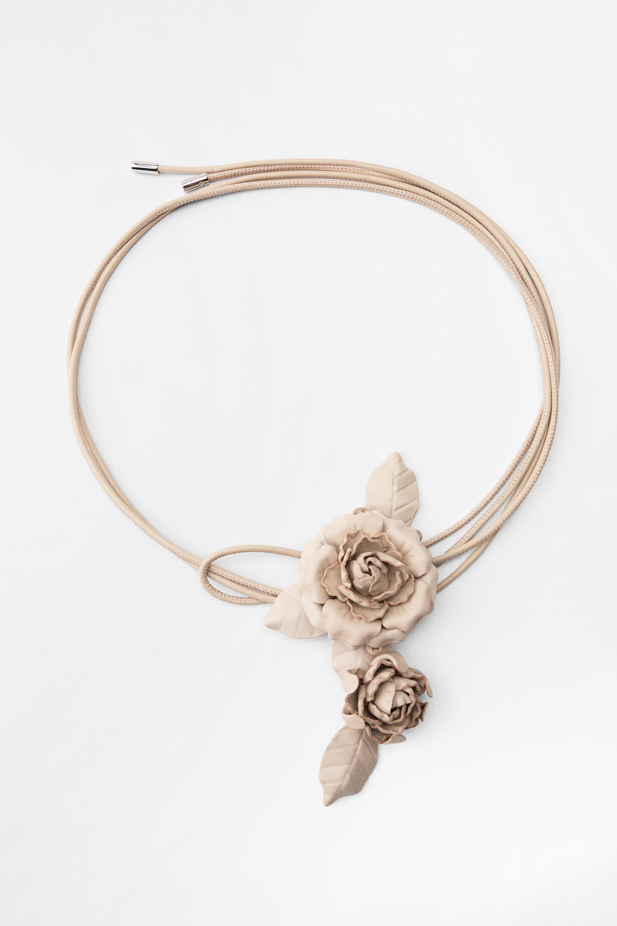 CIRCULAR LEATHER BELT WITH FLOWERS Product Image