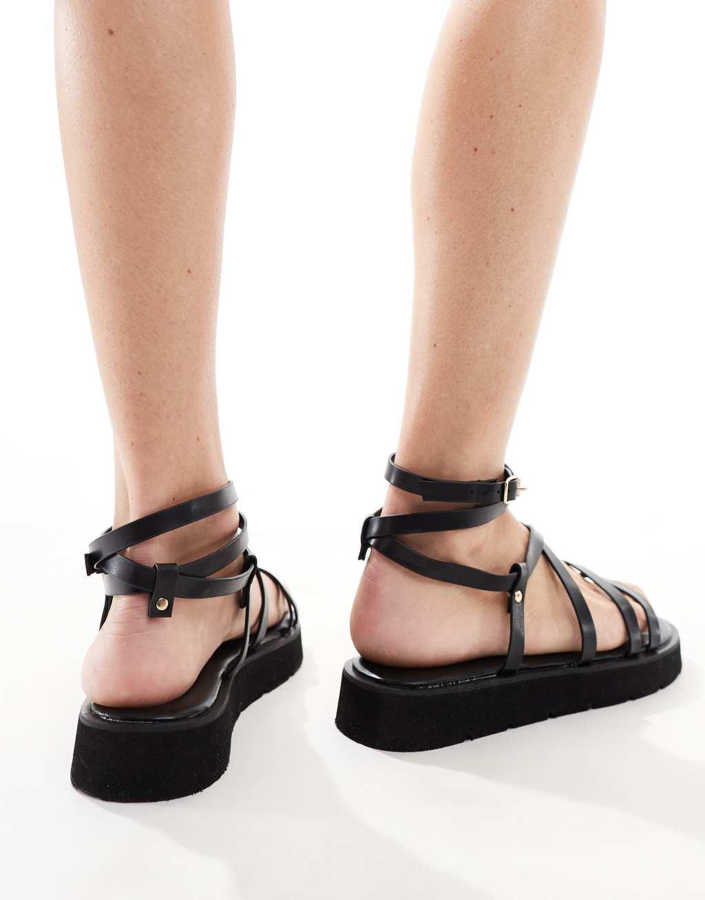 Truffle Collection Wide Fit ankle strap sandals in black Product Image