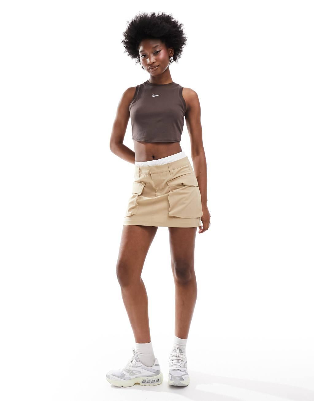 Nike Essential ribbed cropped tank top in brown Product Image