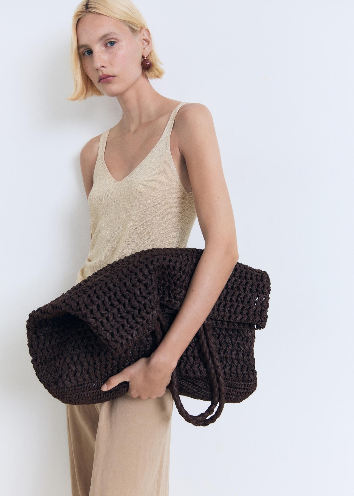 Lurex knitted V-neck top - Women | MANGO USA Product Image