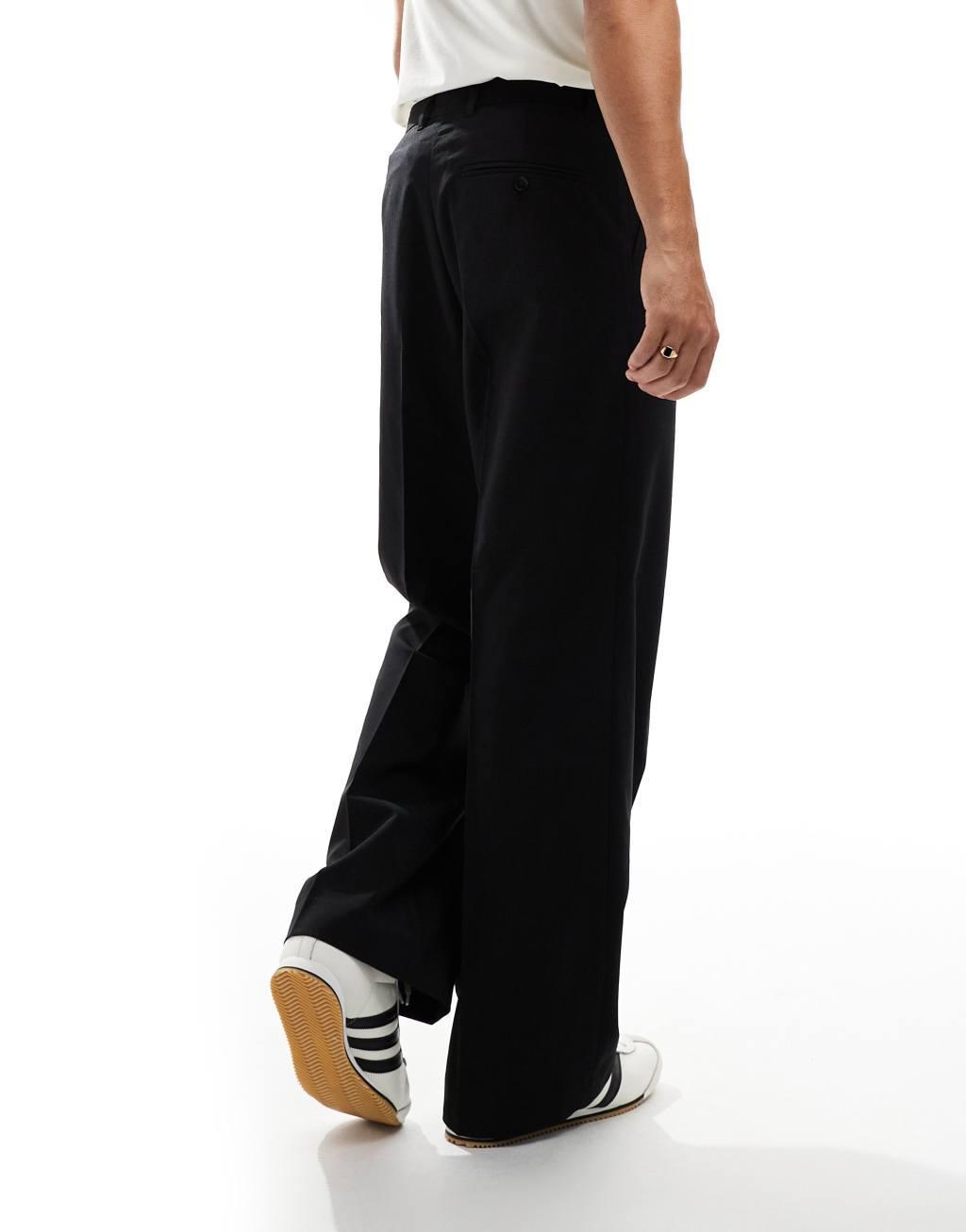 Weekday Uno loose fit tailored pants in black Product Image