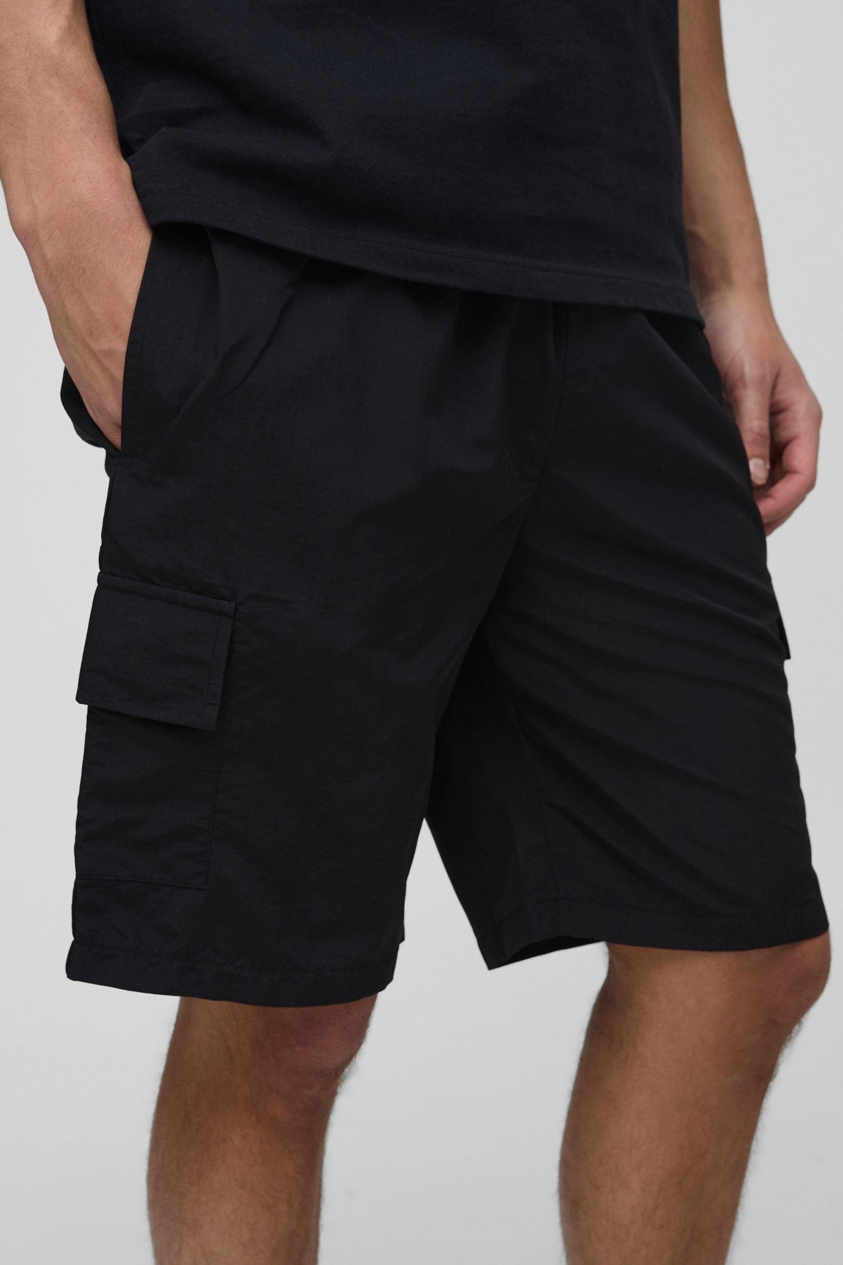 Elasticated Waist Relaxed Mid Length Crinkle Nylon Cargo Shorts | boohooMAN USA Product Image