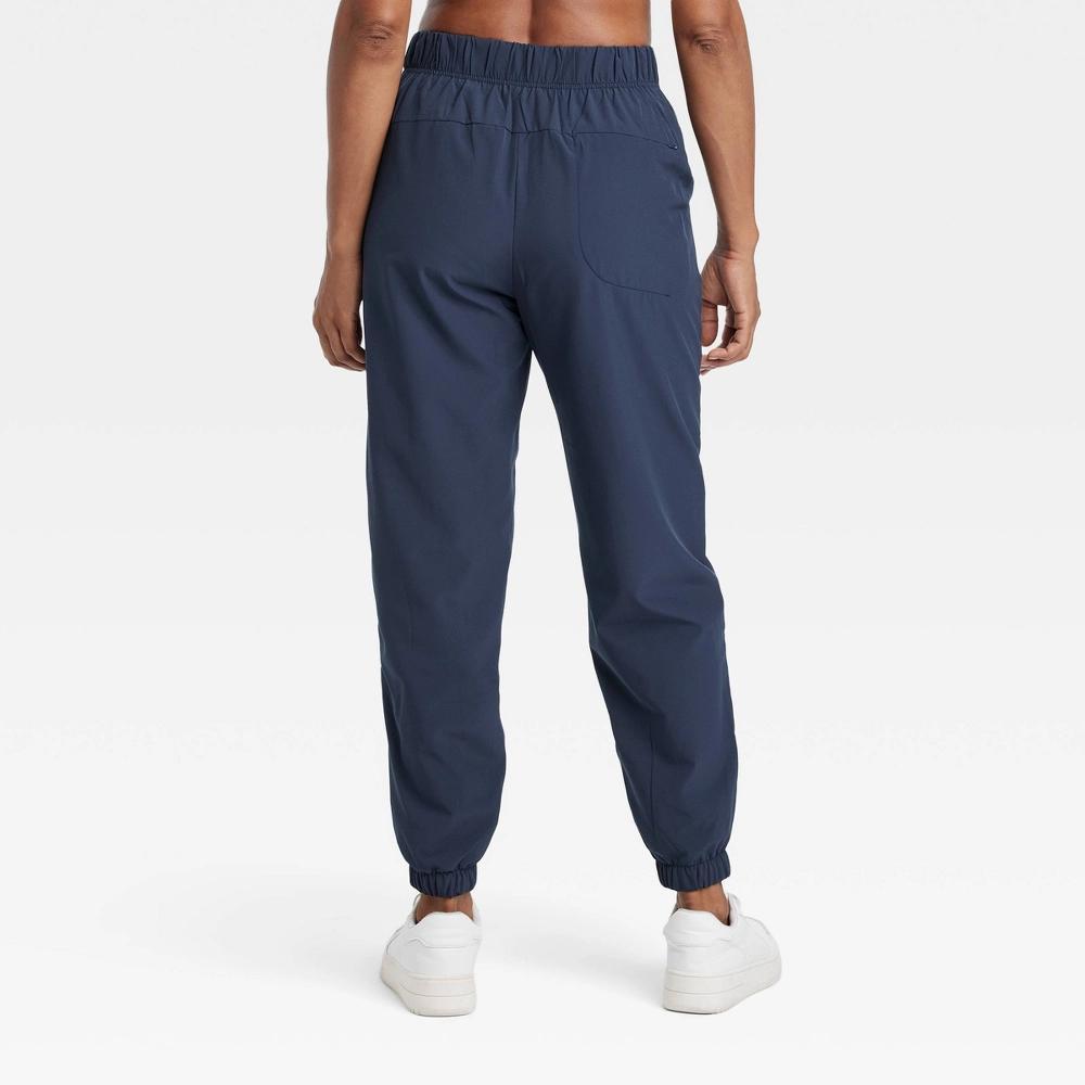 Women's High-Rise Winter Woven Lined Joggers - All In Motion™ Blue L Product Image