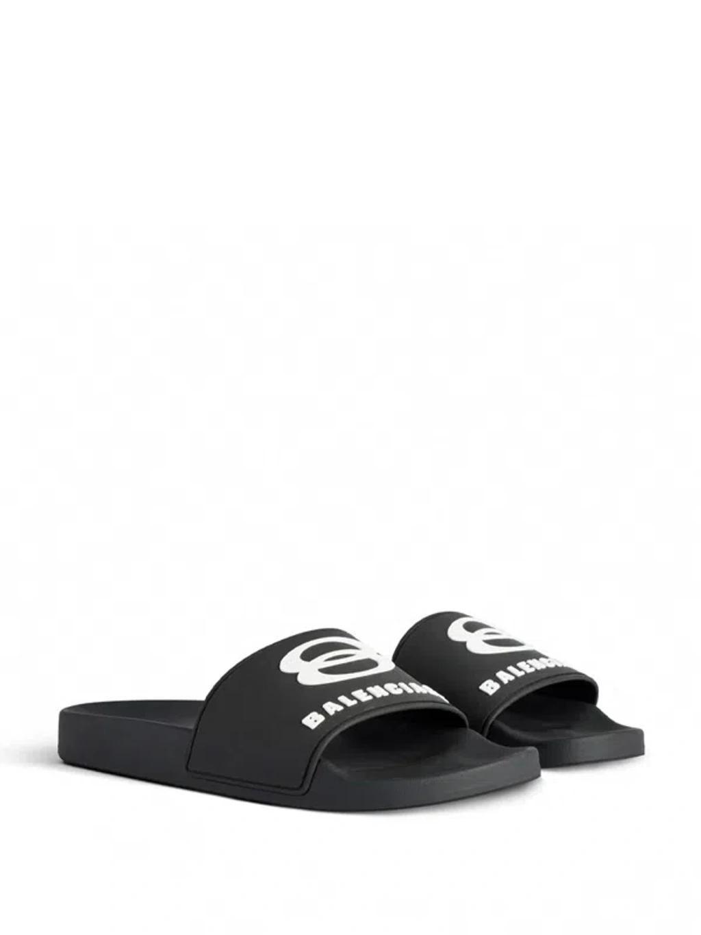 BALENCIAGA Rubber Slide Sandals For The Pool Men In Black White Product Image