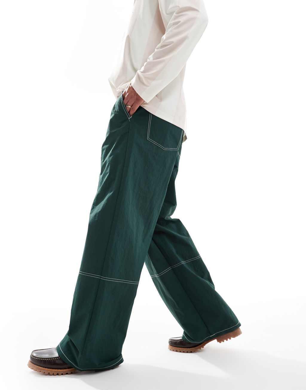 ASOS DESIGN baggy pants in green nylon with contrast stitch Product Image