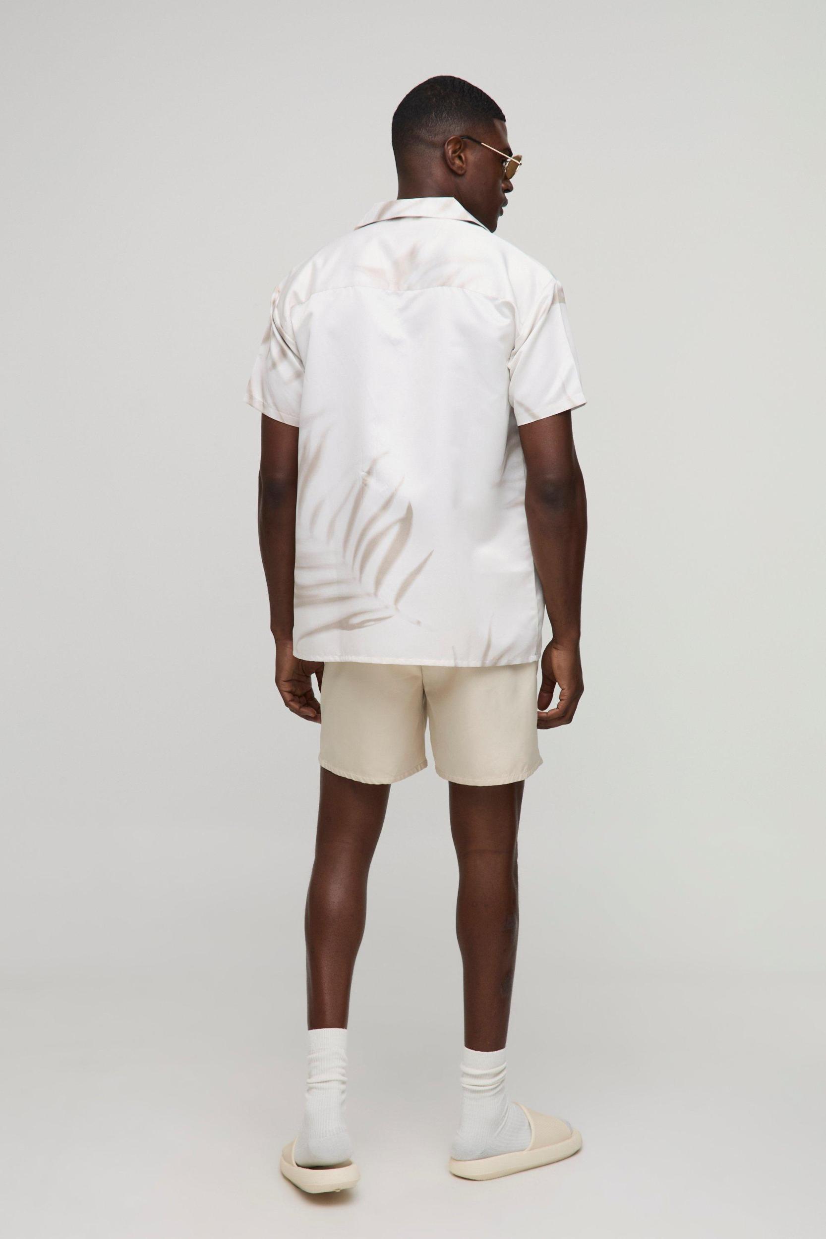 Regular fit Mid length Plain Swim Shorts | boohooMAN USA Product Image