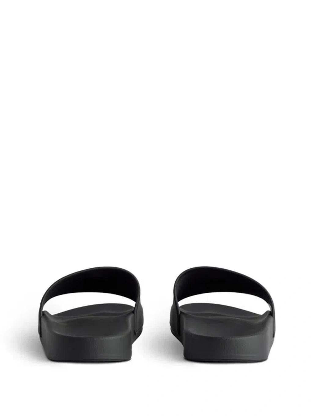 BALENCIAGA Rubber Slide Sandals For The Pool Men In Black White Product Image