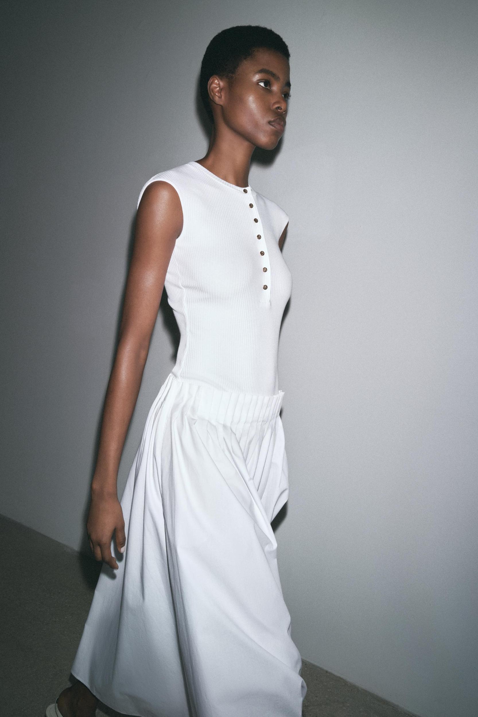 RIBBED BUTTON BODYSUIT Product Image