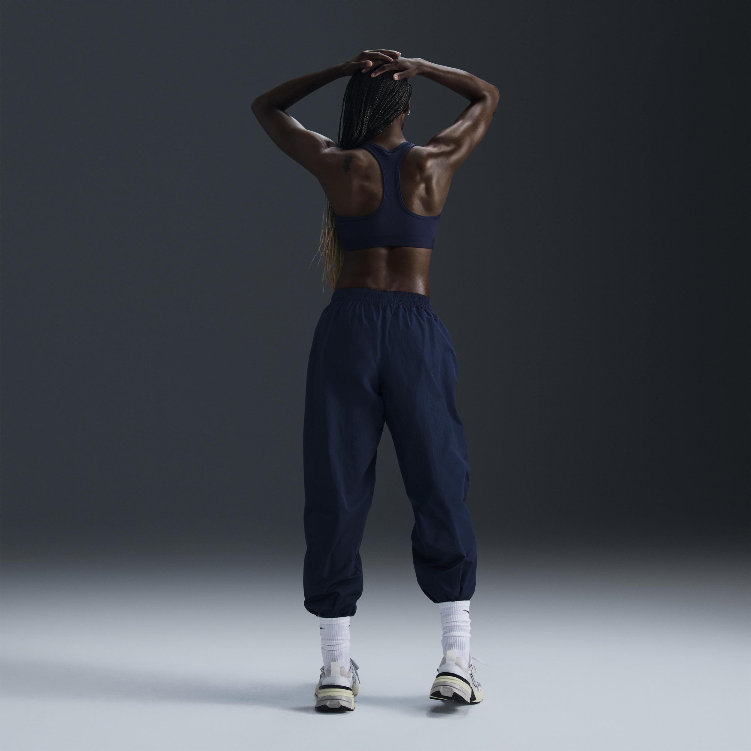 Women's Nike Sportswear Essential Mid-Rise Oversized Woven Jogger Pants Product Image