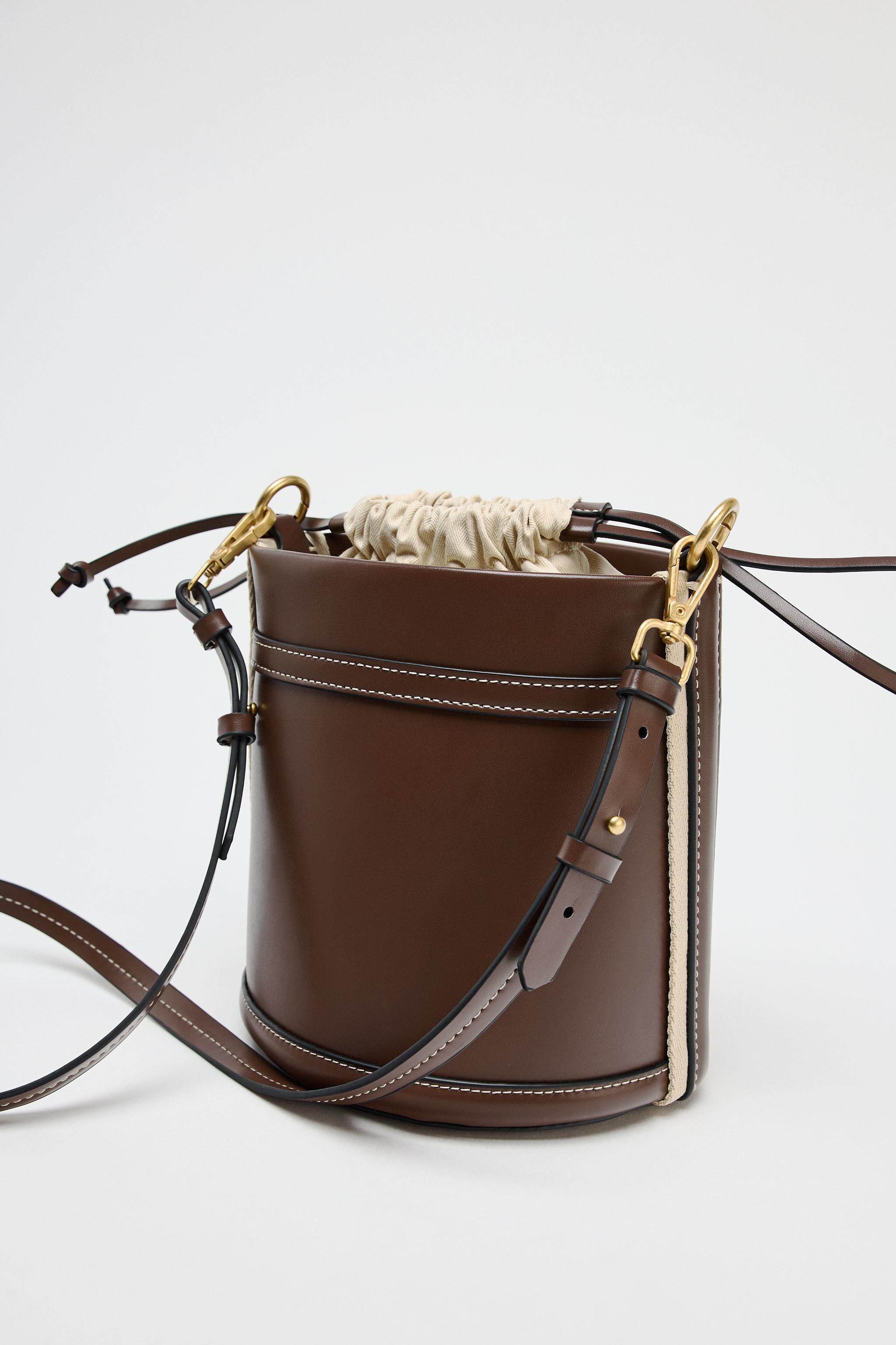 DOUBLE STRAP BUCKET BAG Product Image