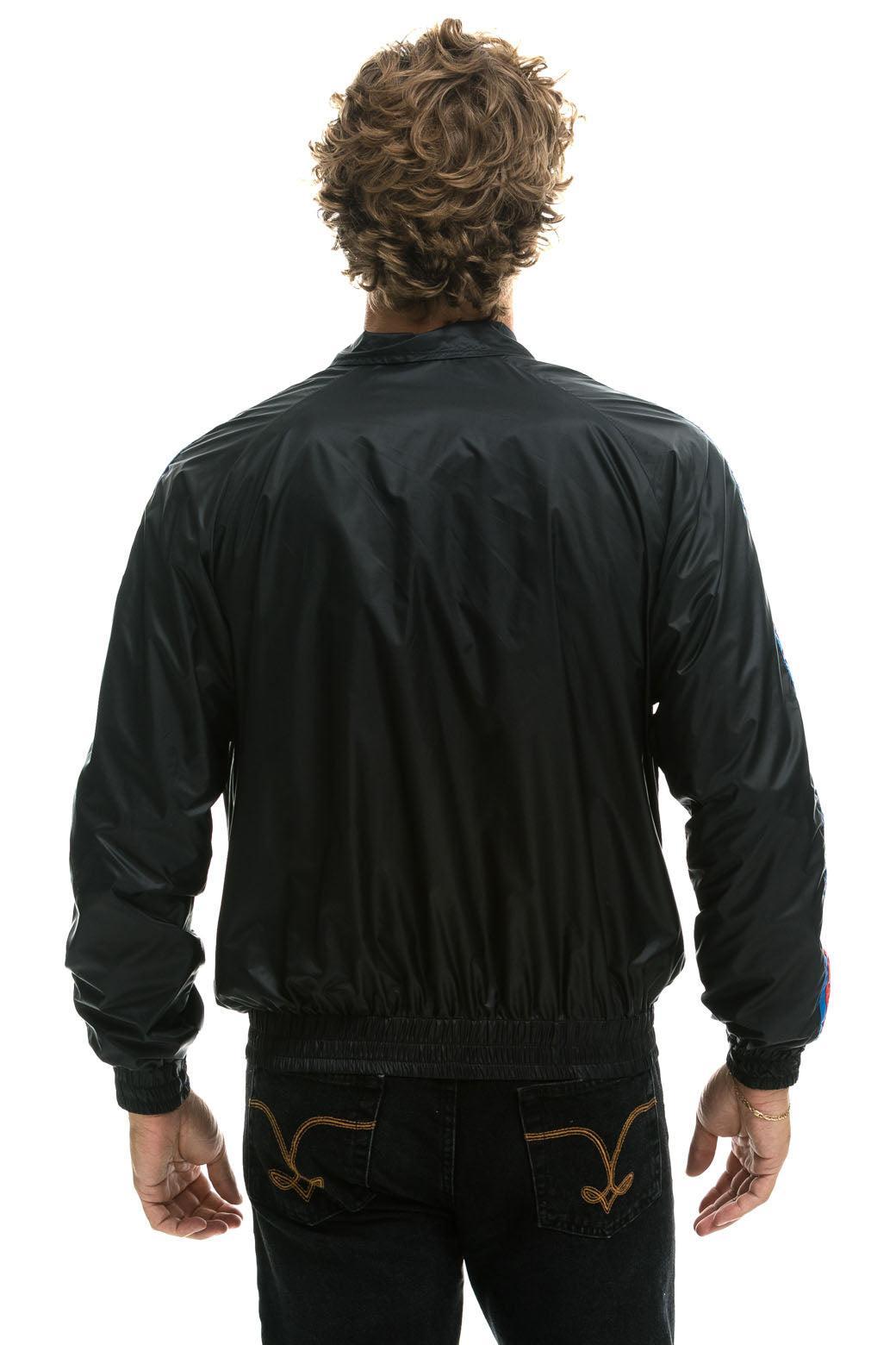 MEN'S 4 STRIPE WINDBREAKER - BLACK Male Product Image