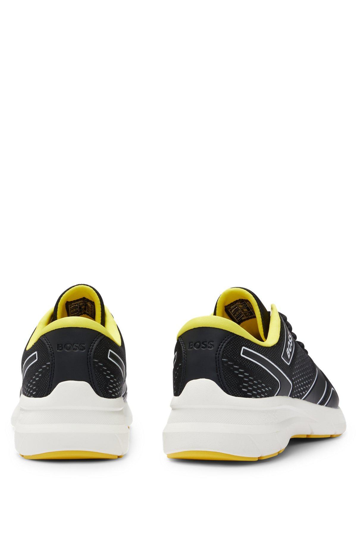 Mixed-material trainers with rubberized faux leather Product Image