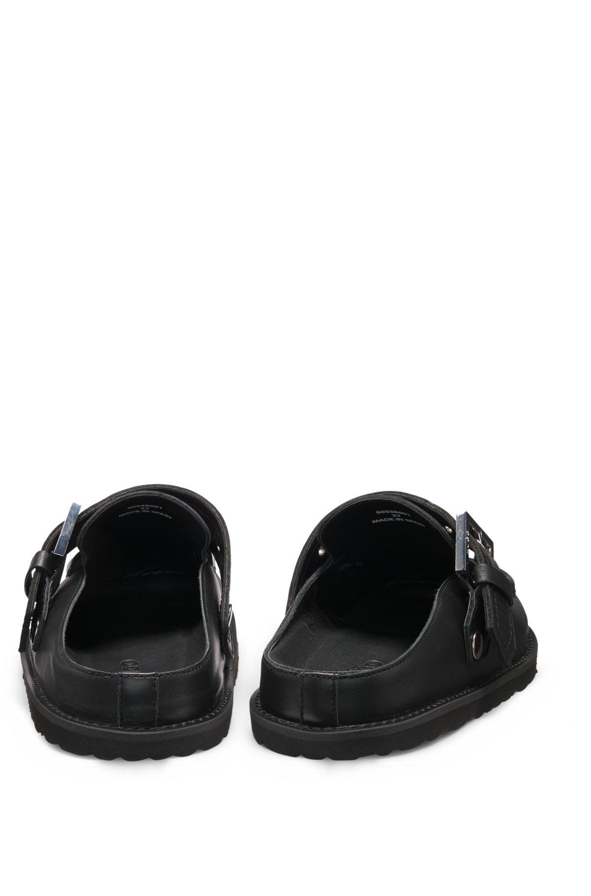 Nappa-leather sabots with buckled strap Product Image