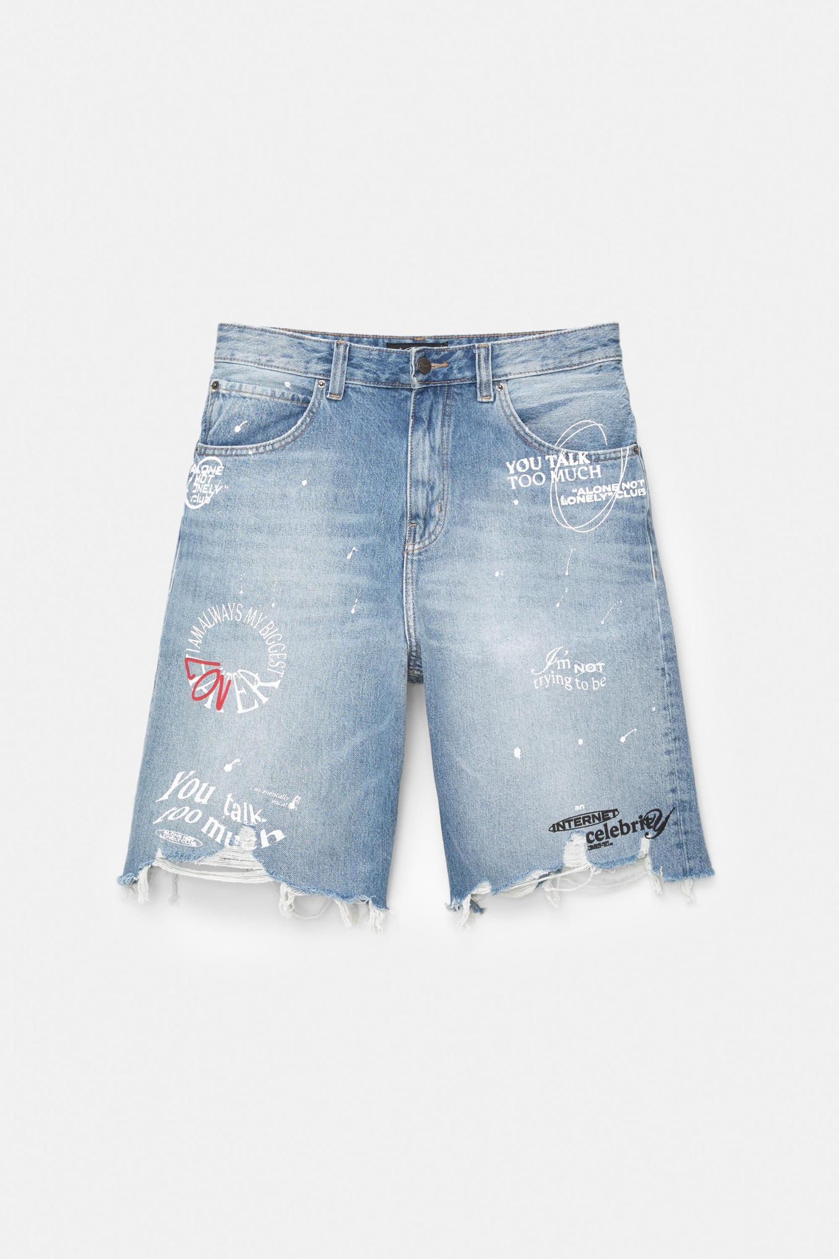 Ripped denim Bermuda shorts Product Image