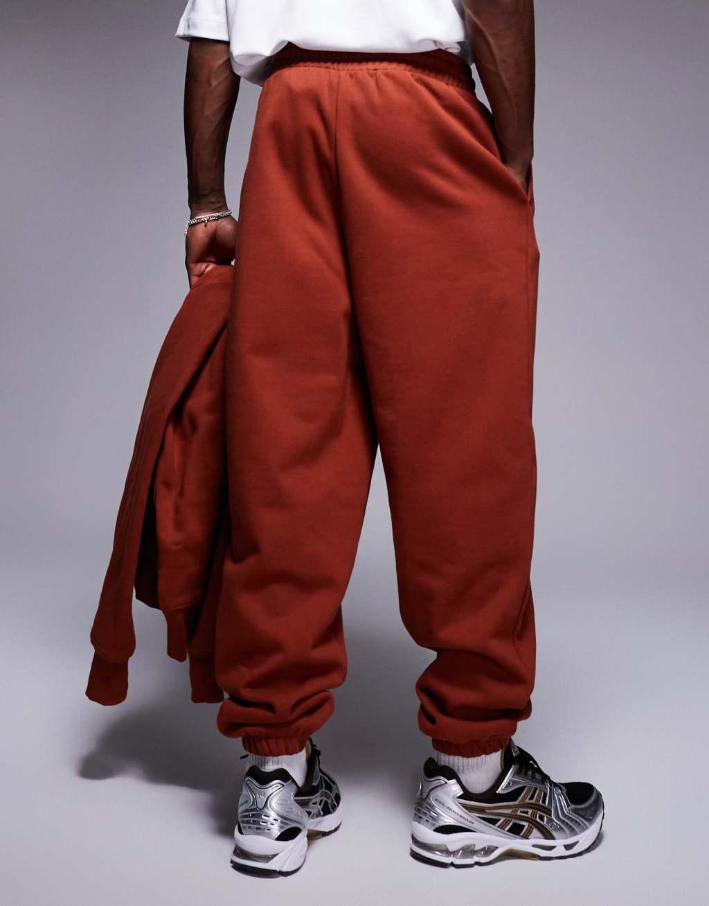 ASOS DESIGN premium heavyweight oversized sweatpants in burnt red Product Image