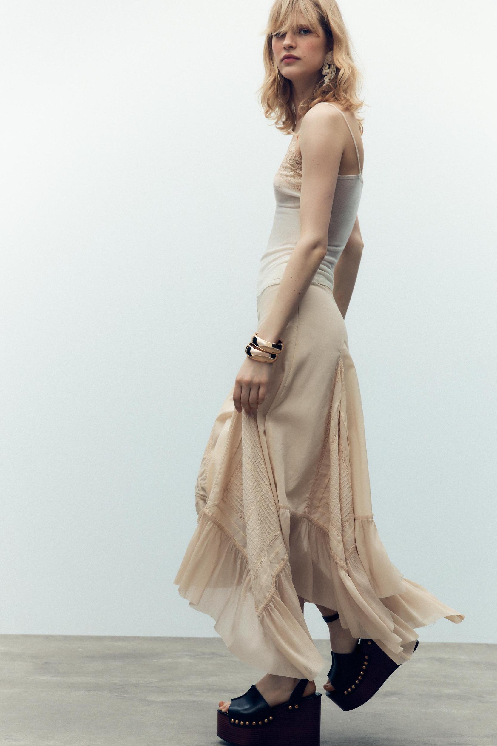 ASYMMETRIC PLEATED SKIRT Product Image