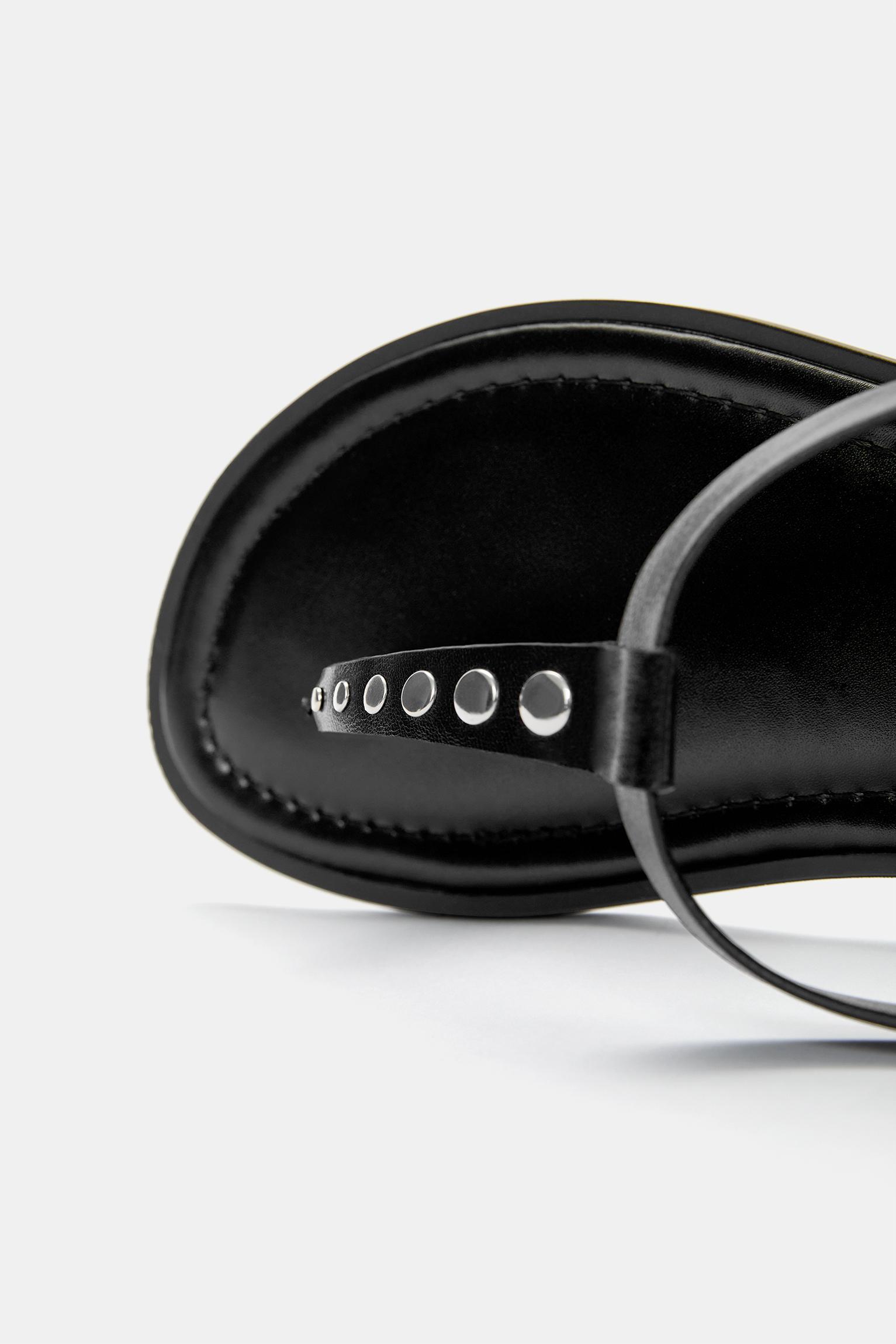 Flat sandals with decorations Product Image