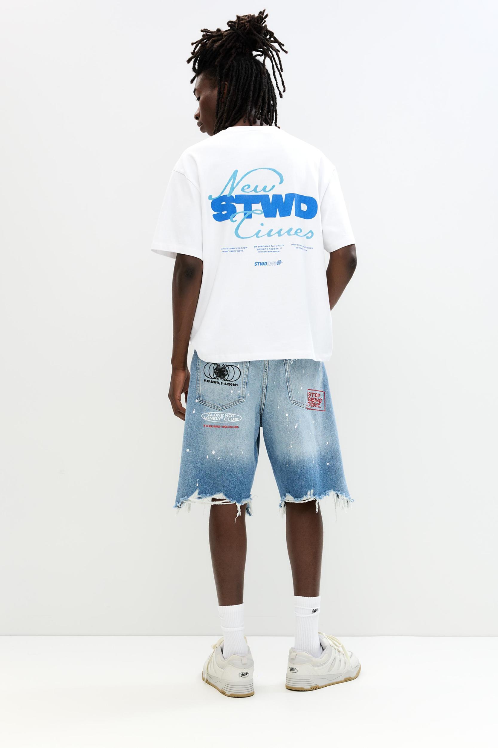 Ripped denim Bermuda shorts Product Image