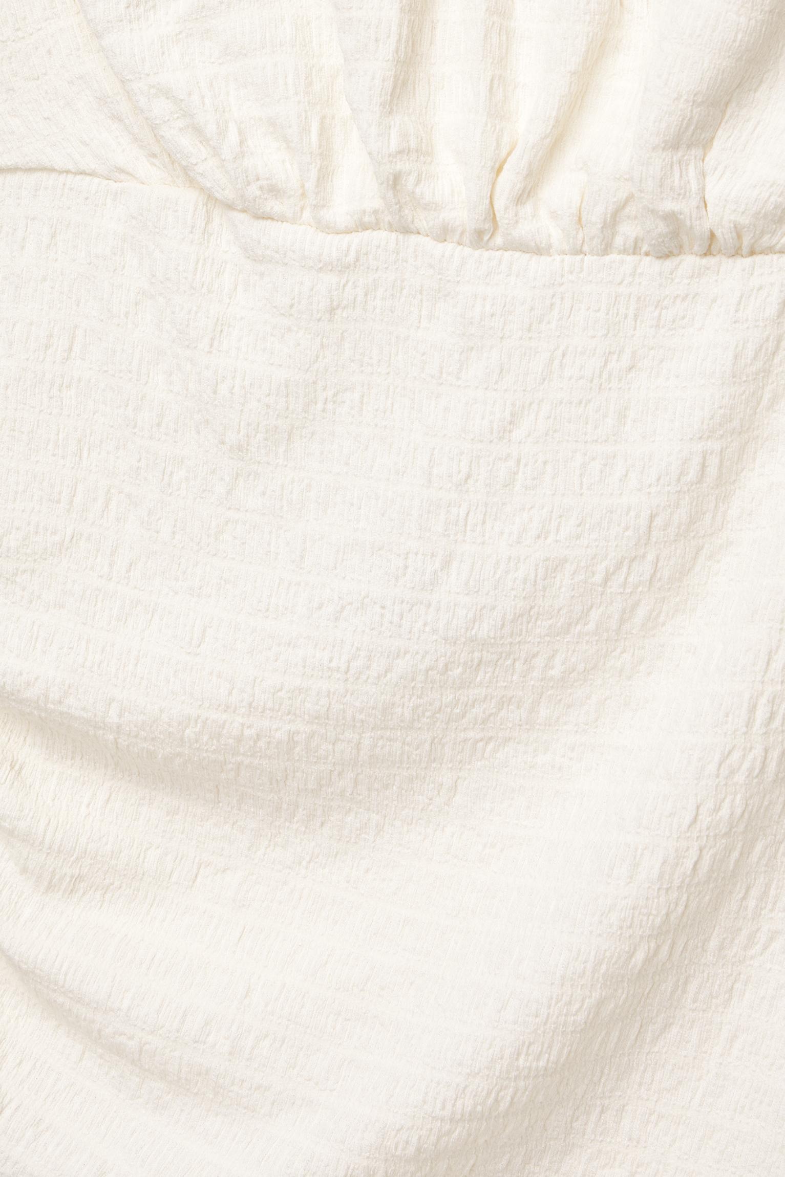 Asymmetric crepe top Product Image