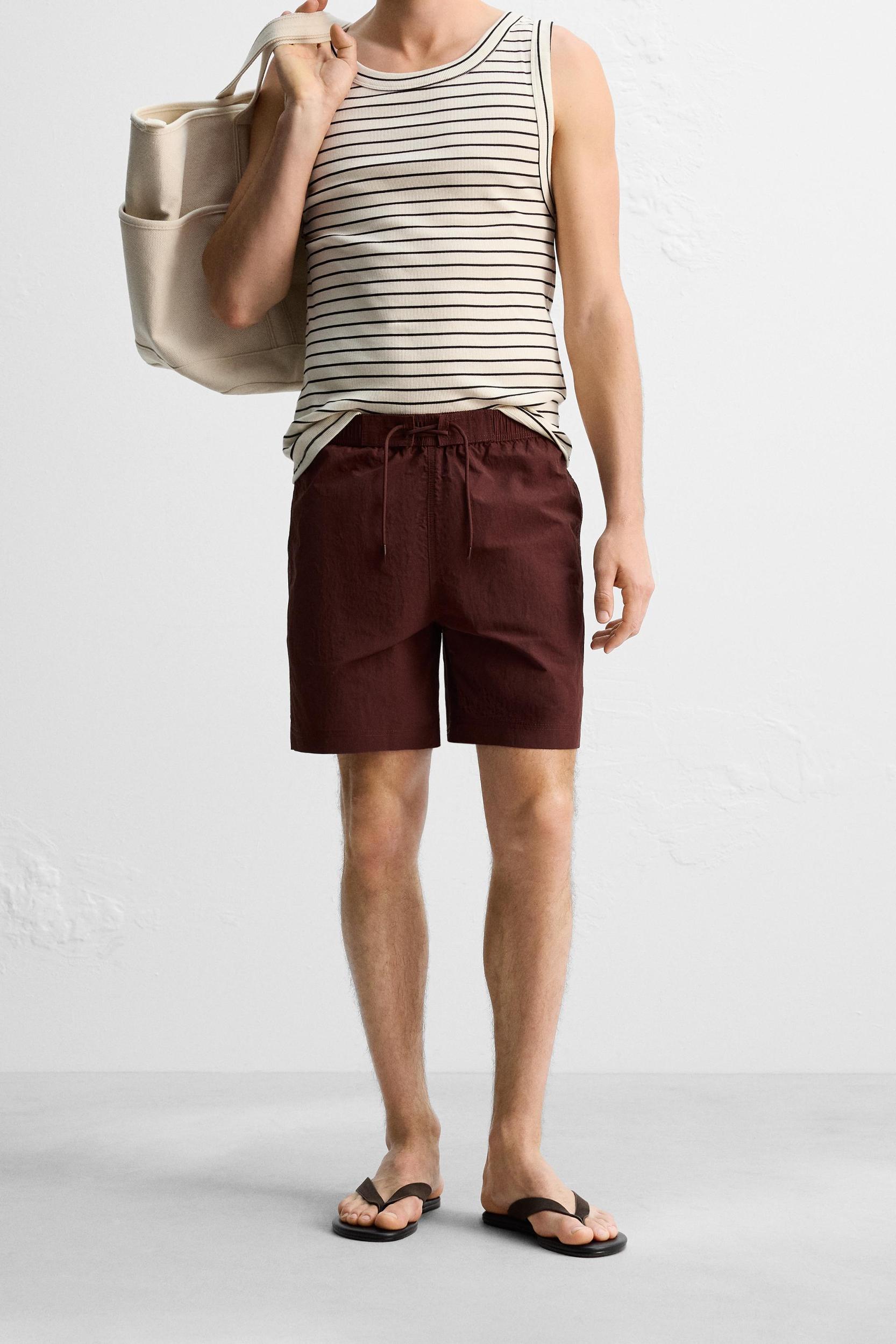 DRAWSTRING SWIM TRUNKS Product Image