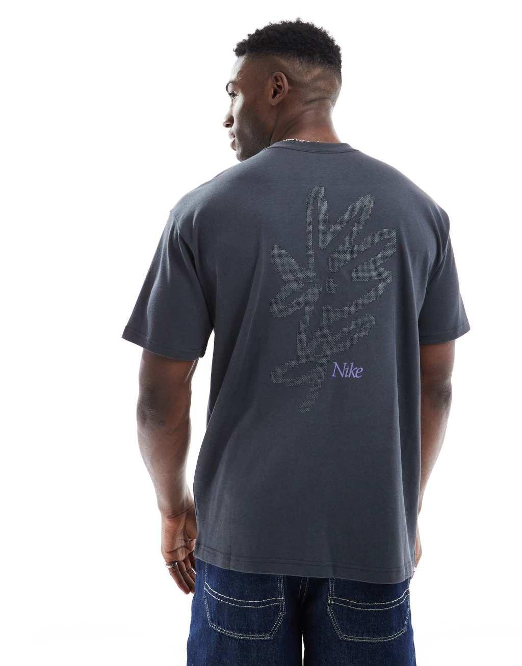 Nike flower graphic T-shirt in black Product Image