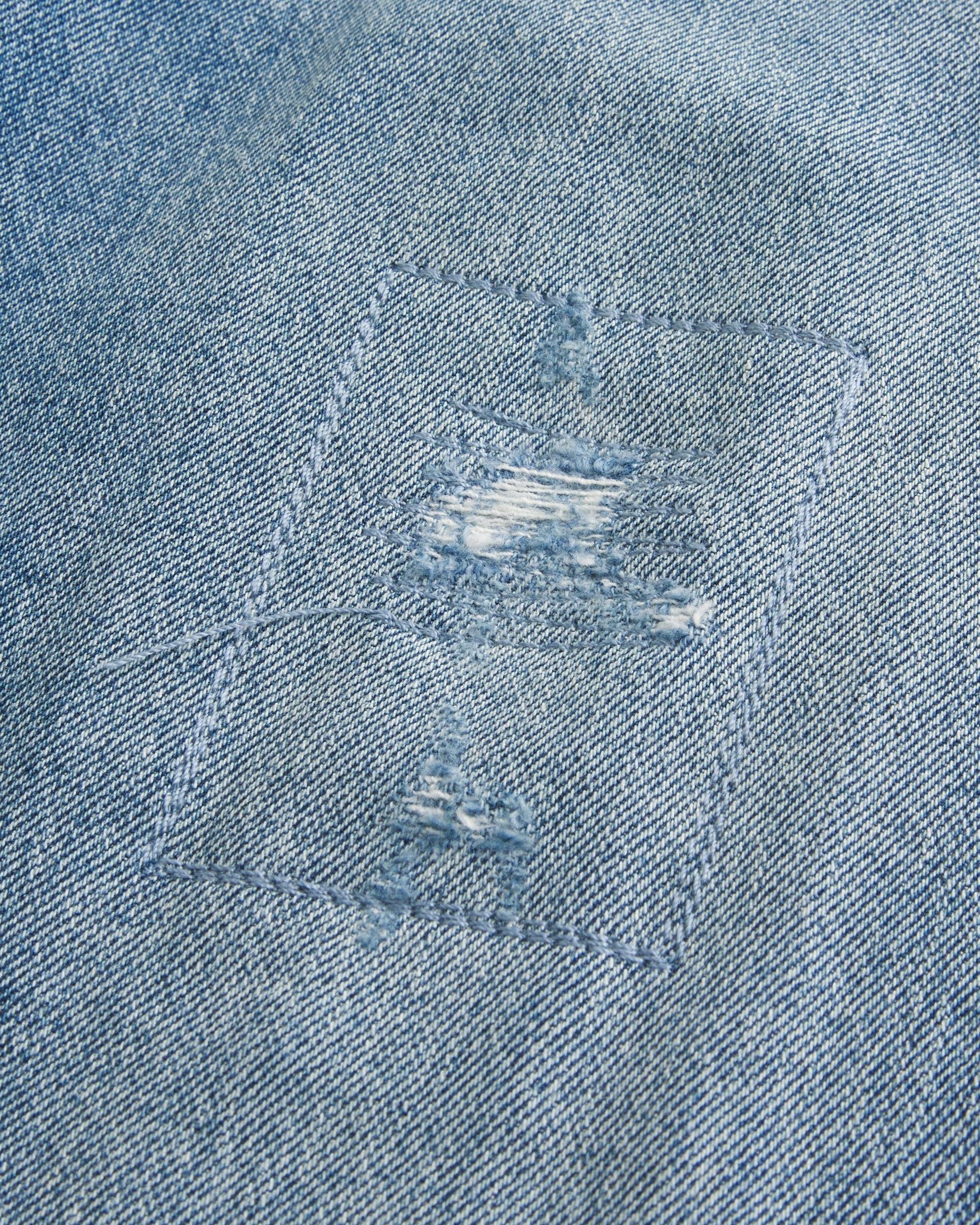 Distressed Medium Wash Baggy Jeans Product Image